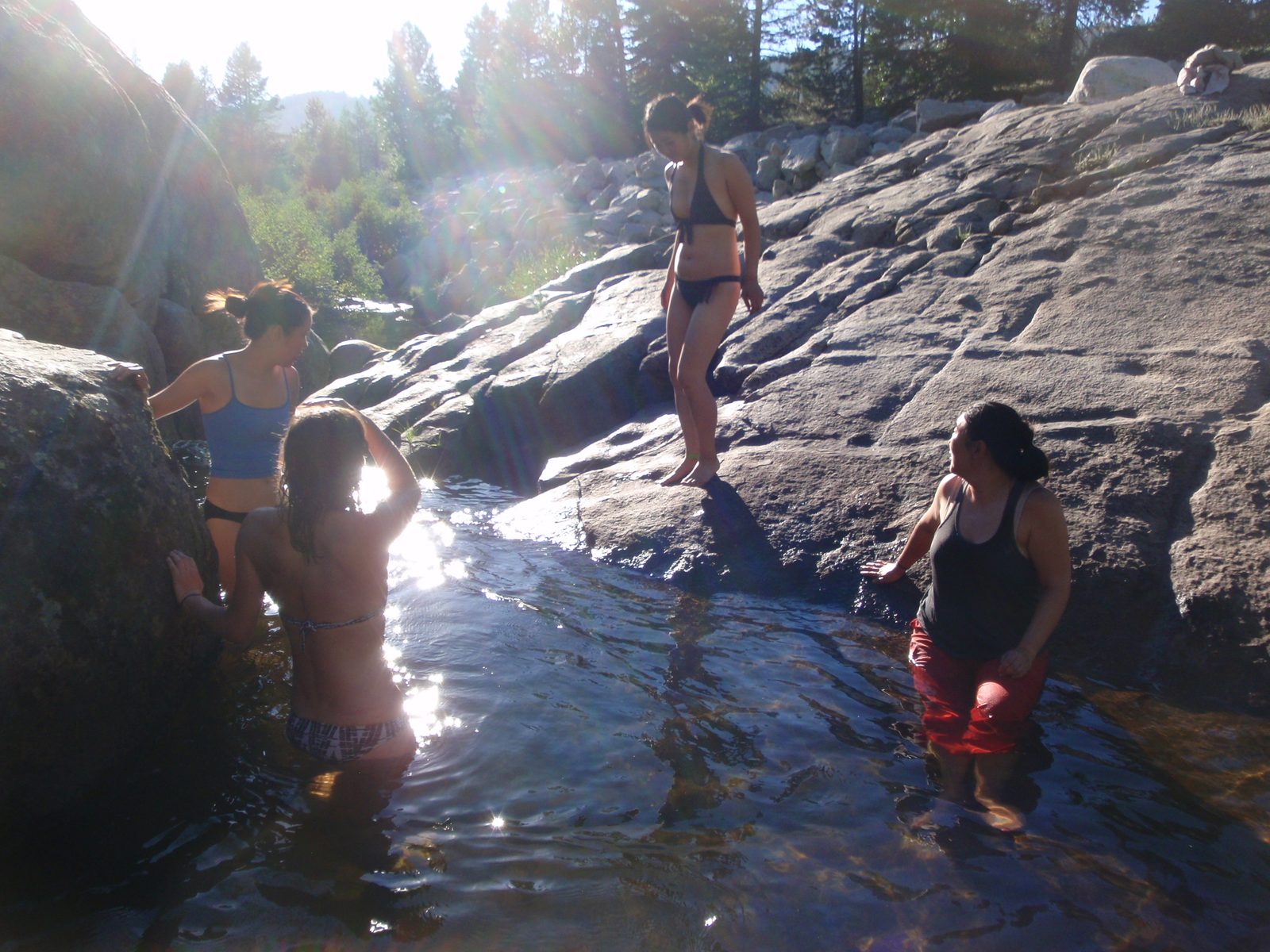 Going swimming at a swim hole after a hot day climbing at Donner Summit near Tahoe. Jen, Lee,...