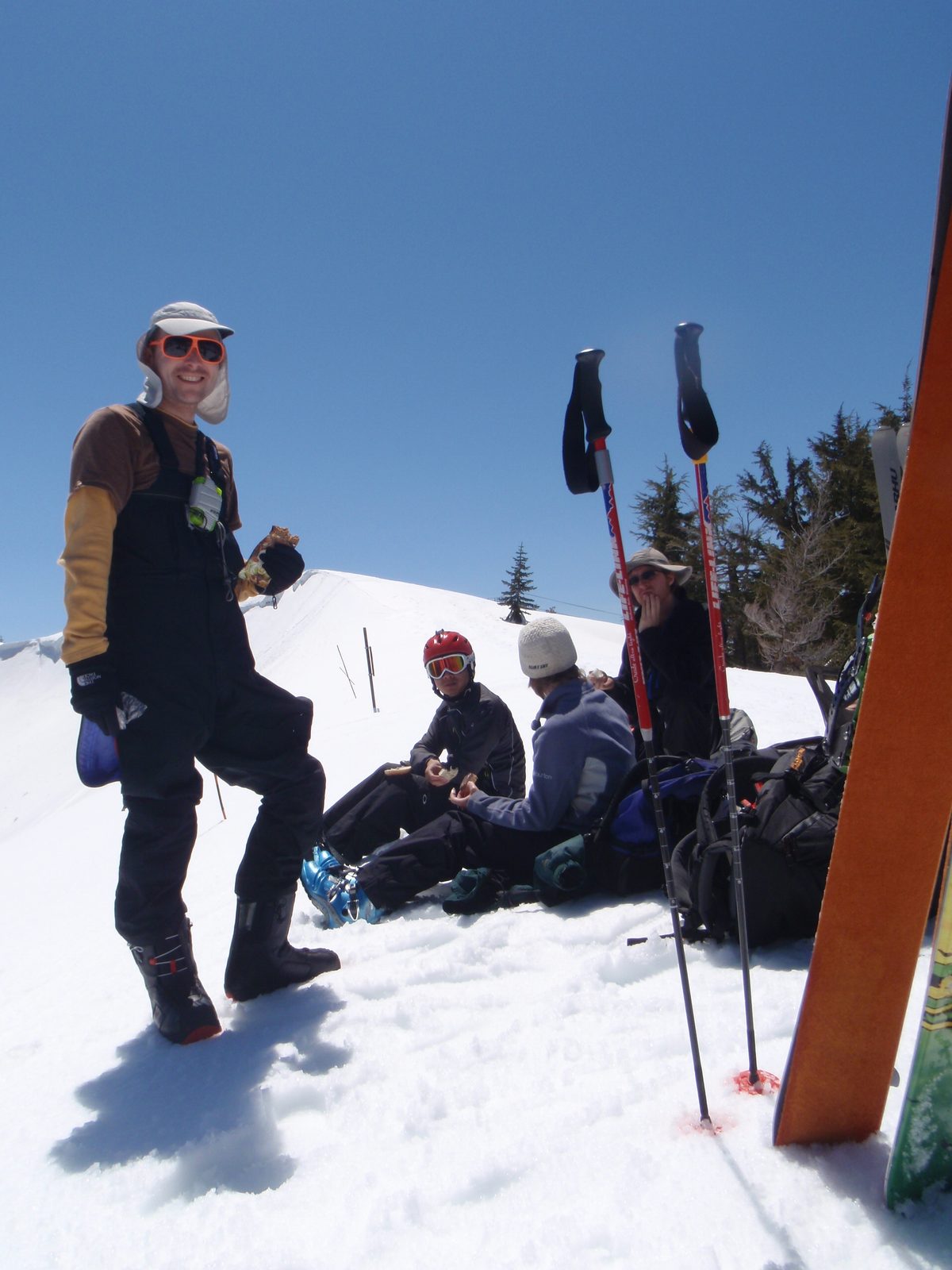 Eating lunch on Mt. Judah: John, Yang, Mary, and Pete.