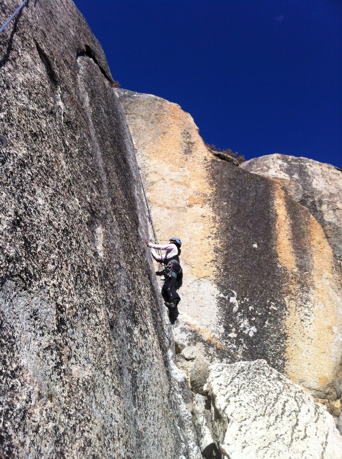 Monica climbing Clean Corner, a fun 5.8 warmup. 