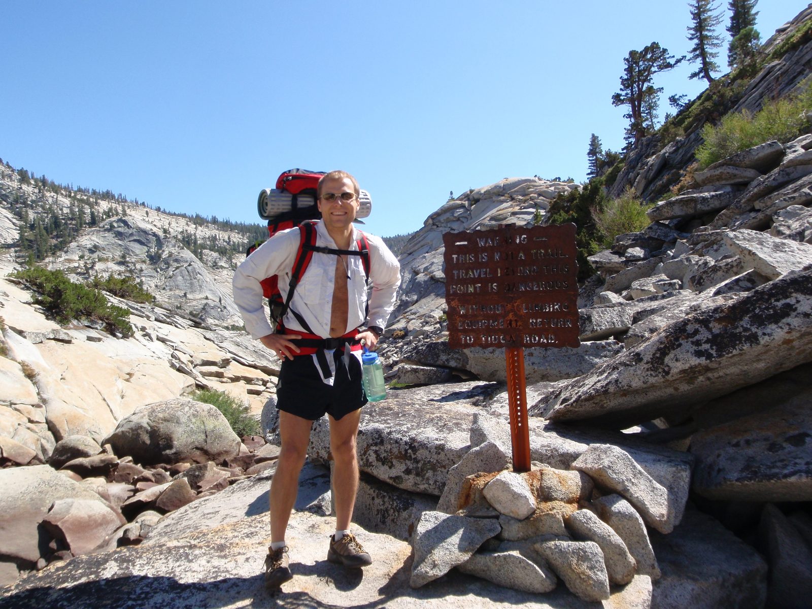 John, standing in front of the "Abandon all hope, ye who pass this point" sign at the entrance...
