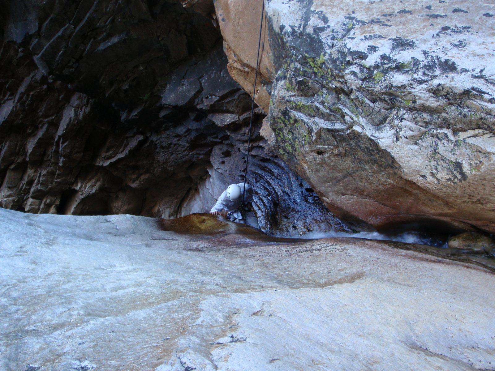 John rappelling through the waterfall.