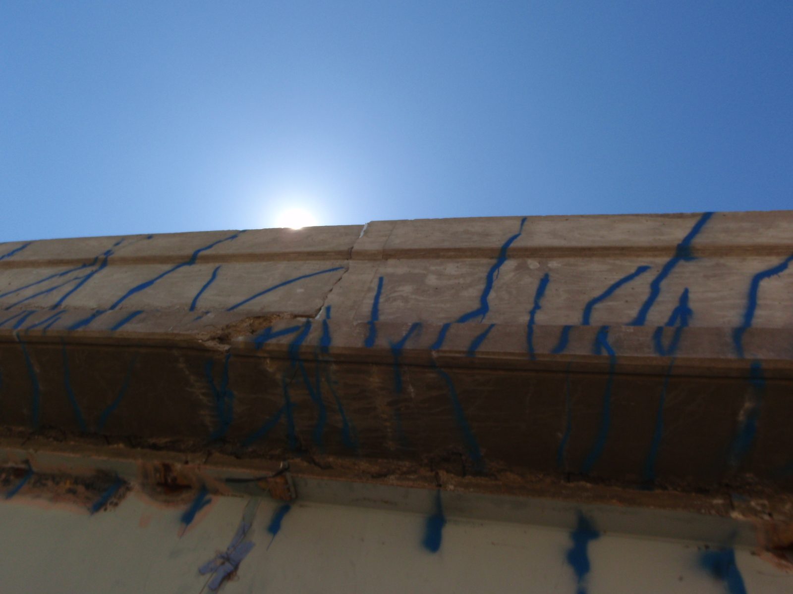 They put spray paint where all the cracks are, which apparently are hard to see, otherwise.