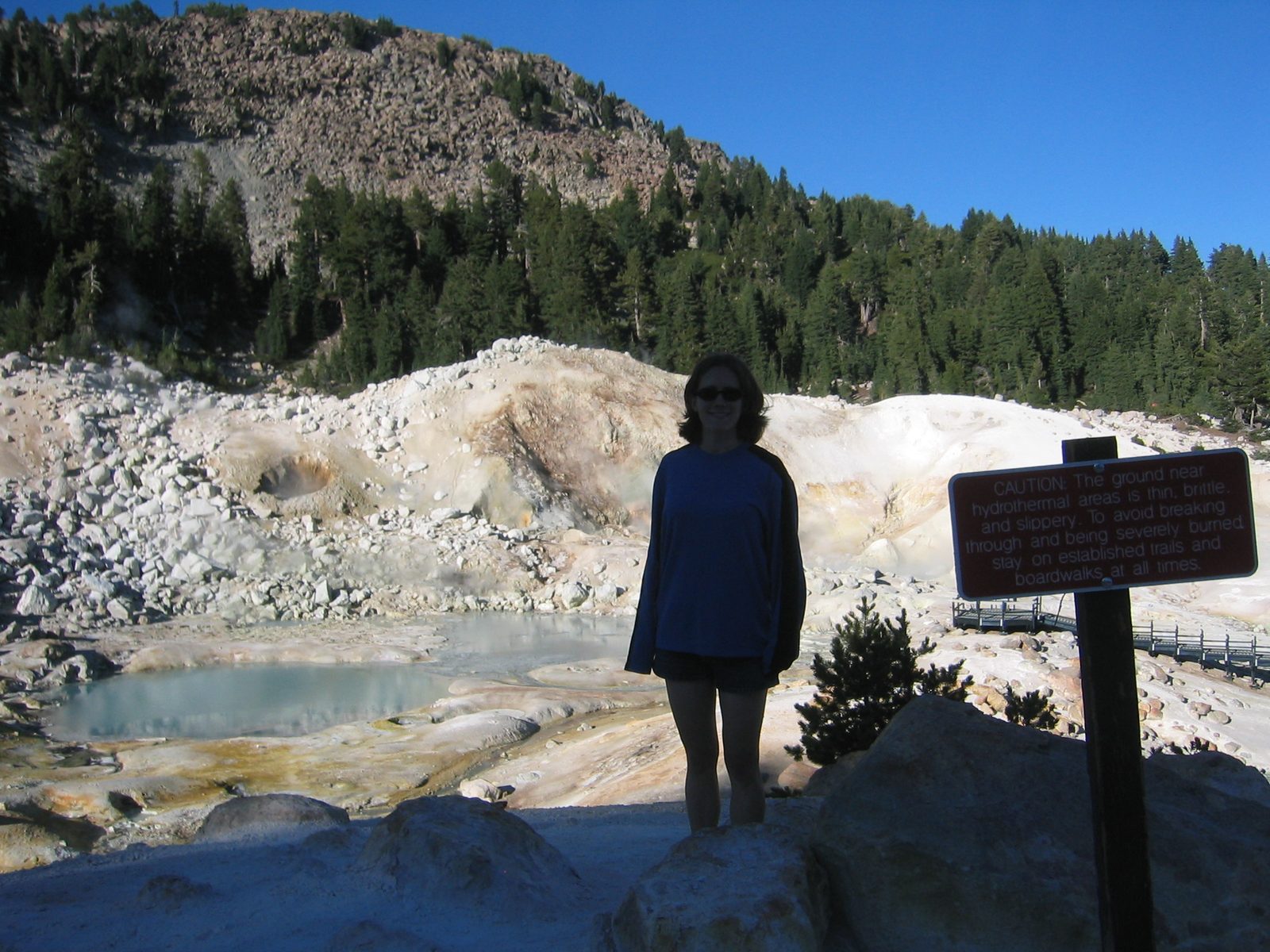 Alison, making a candidacy for a Darwin Award.  (Zoom in to read sign.)