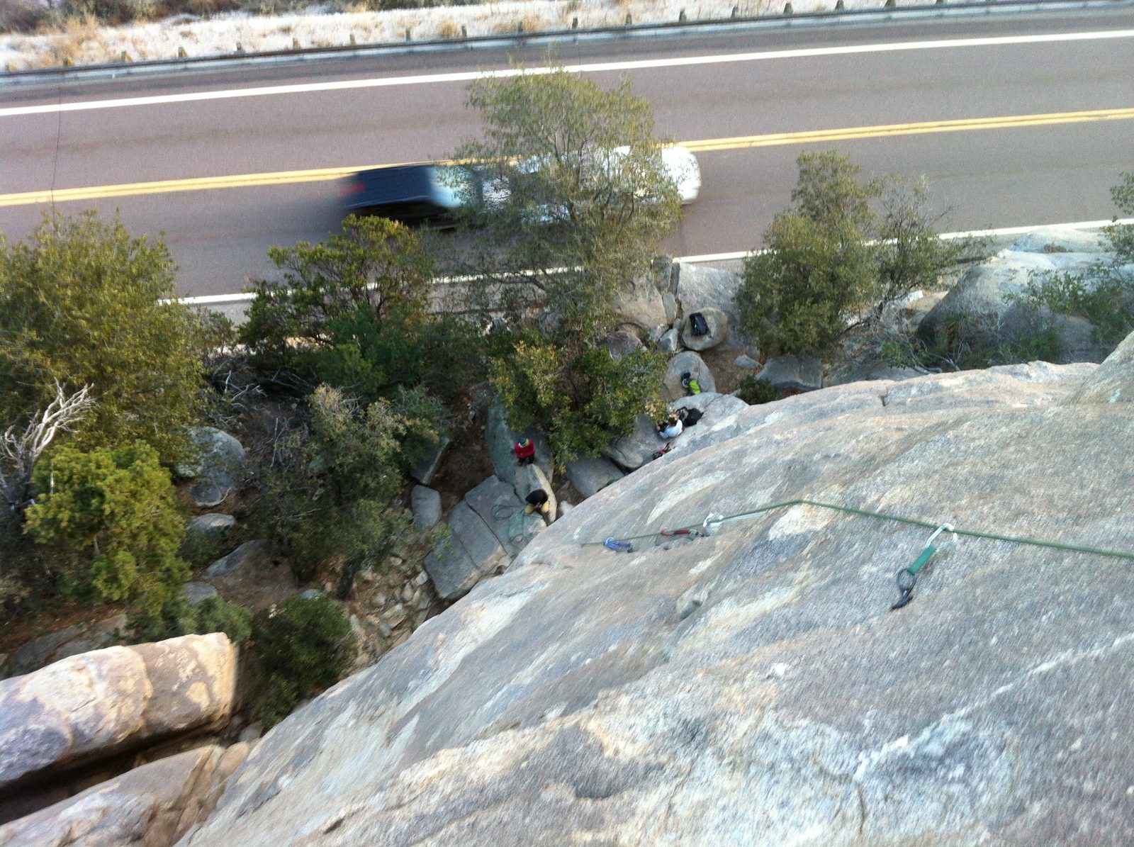 Shot from the top after leading Mistaken Identity (5.9). Catherine is sitting on a rock. Monica...