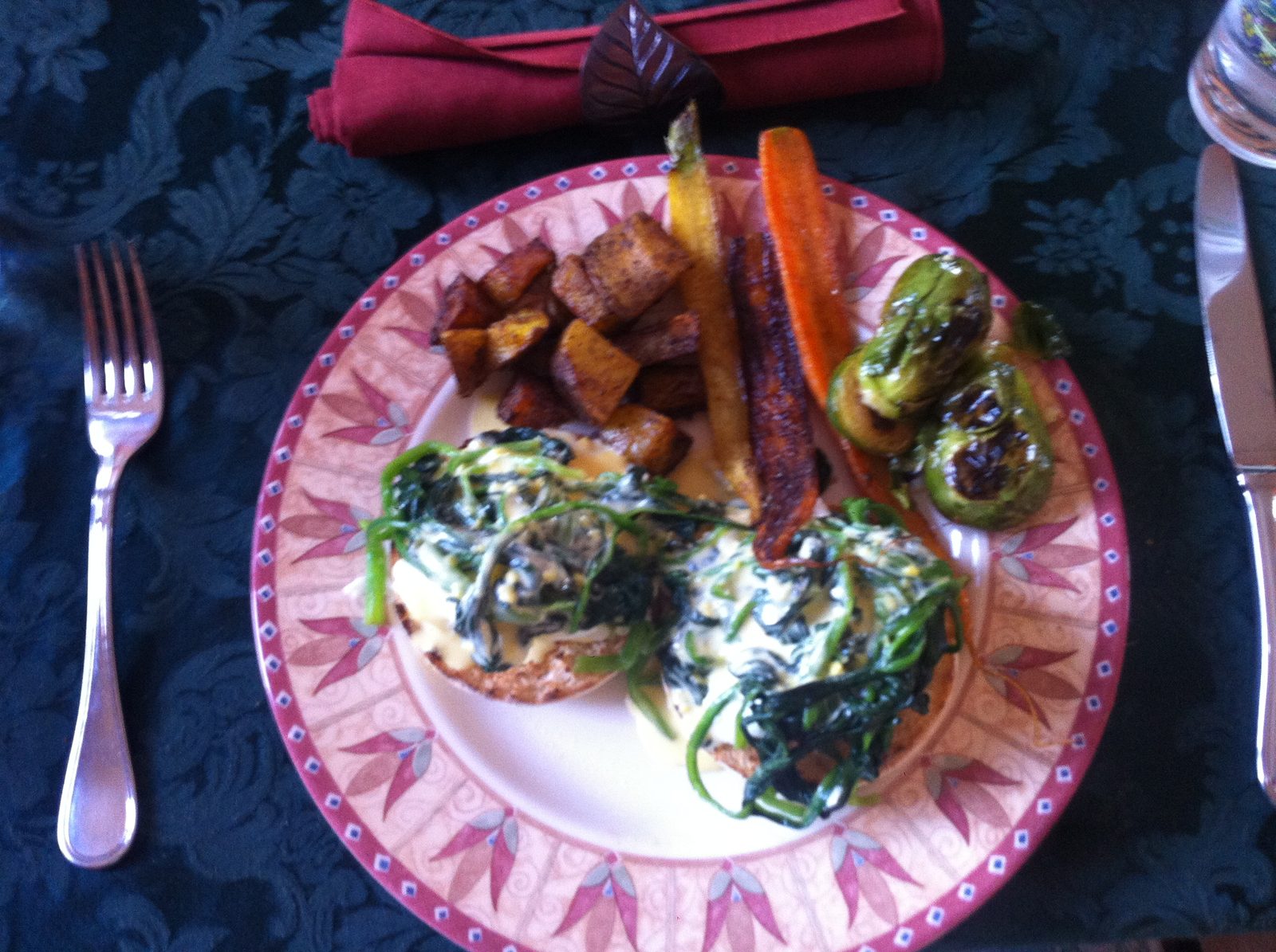 John's breakfast the morning after Christmas. Eggs florentine, potatoes, cumin carrots and...