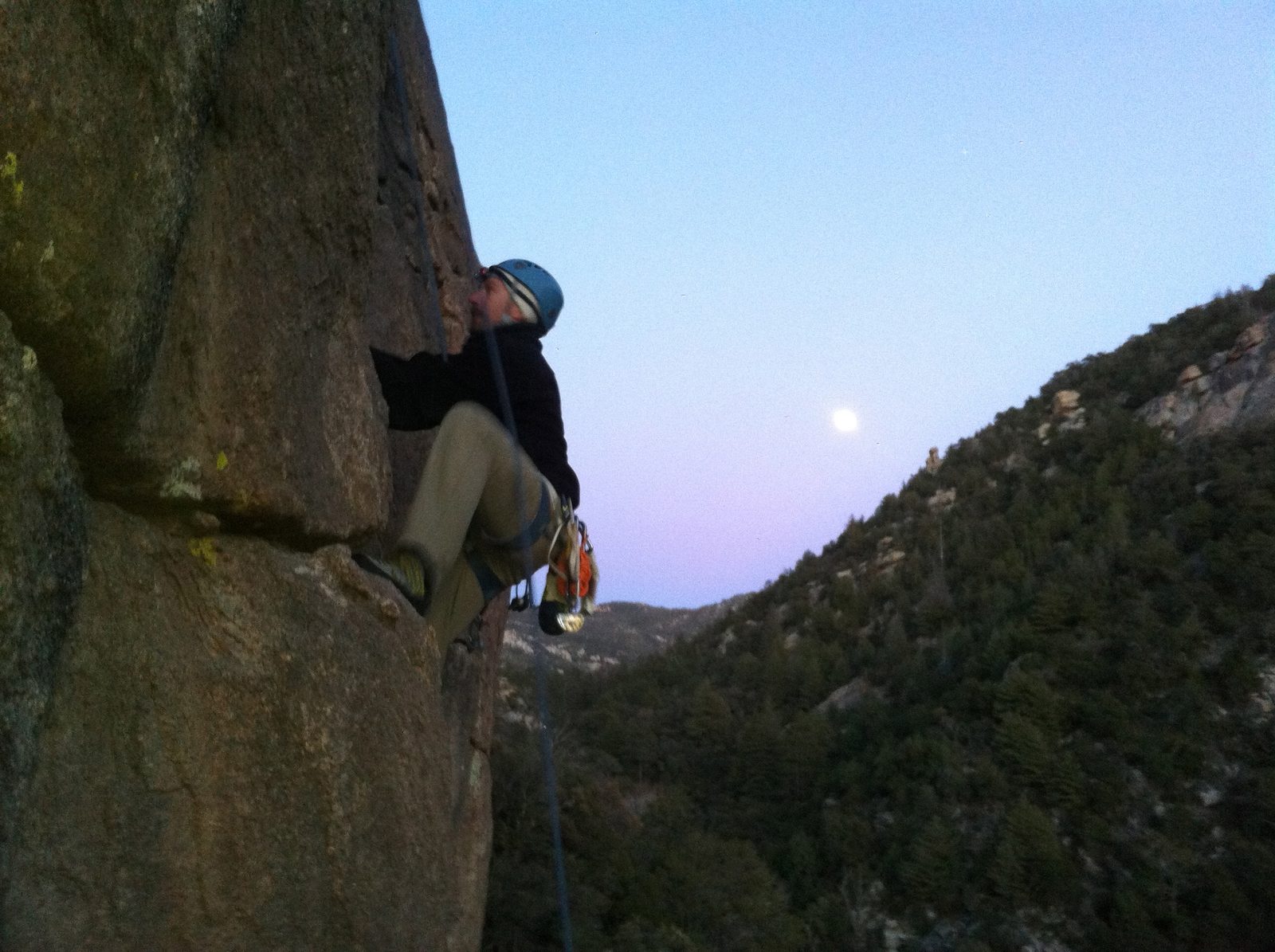 Ian, climbing as the moon rises to the east.