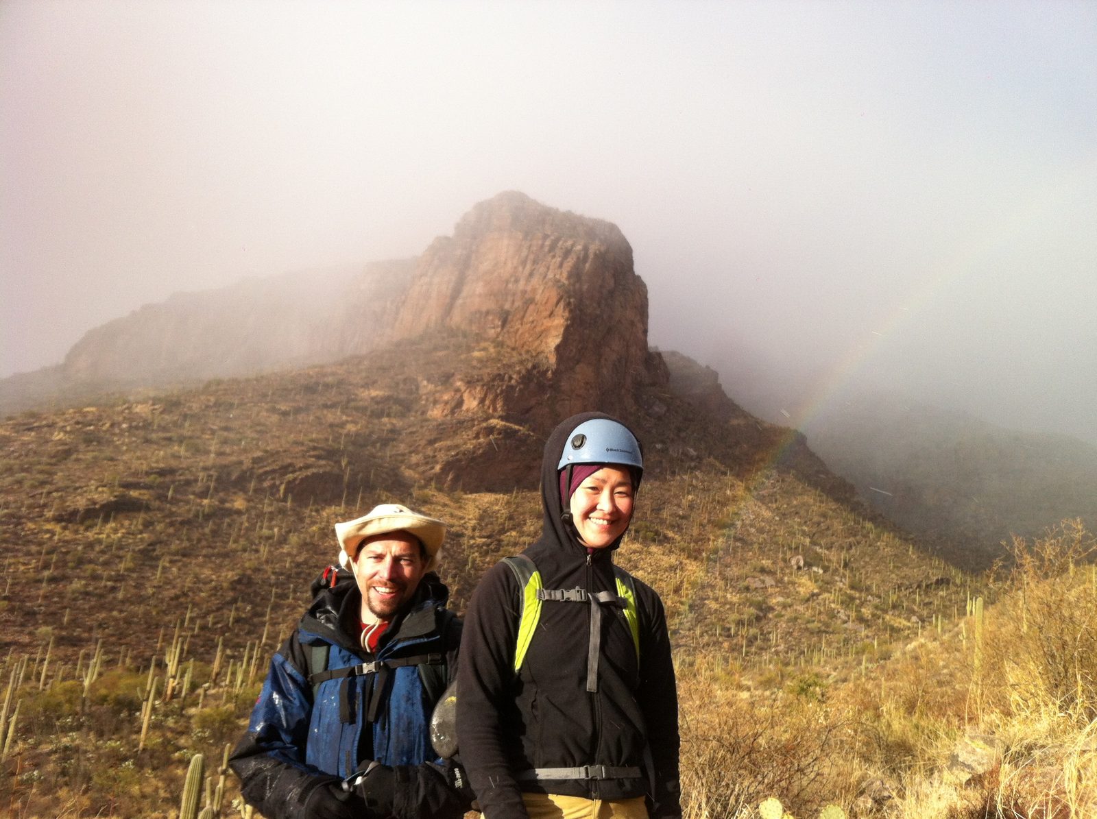 Ian and Monica leaving the snow storm behind and into the rain. Also rainbow at right.