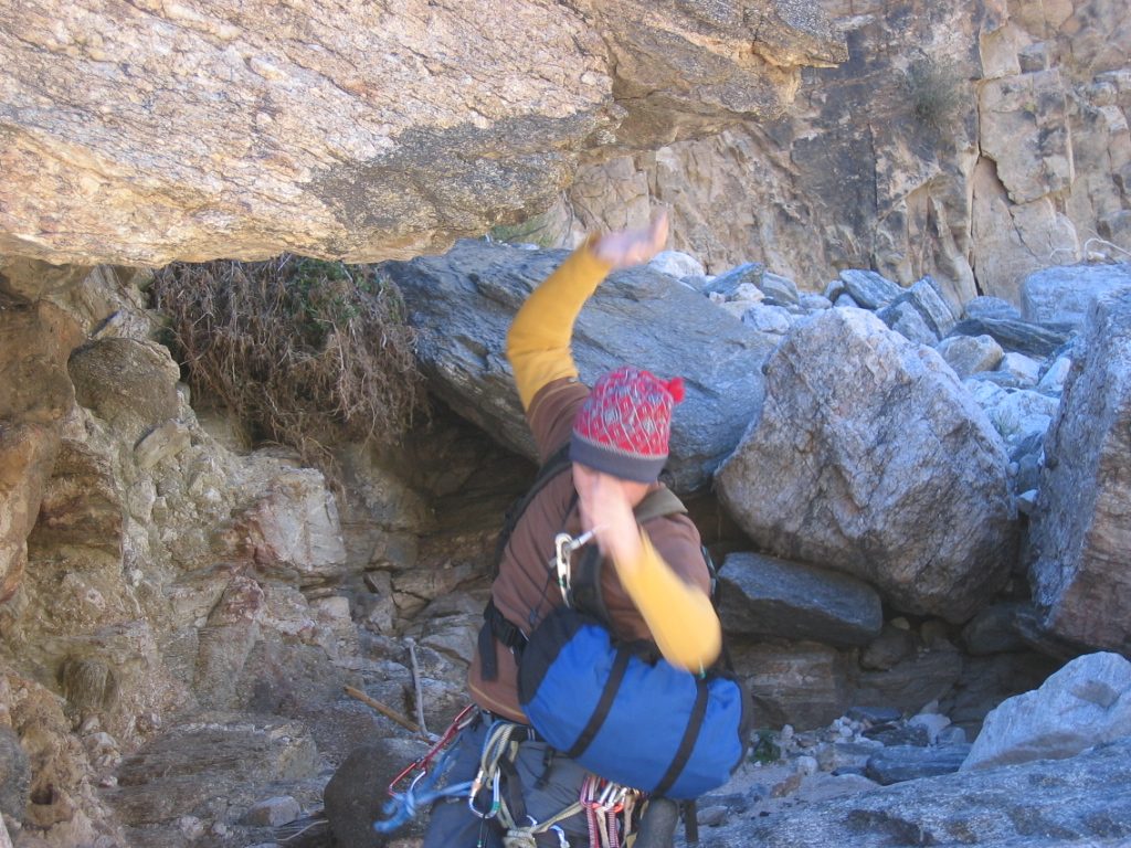 Jumping off the boulder motion shot.
