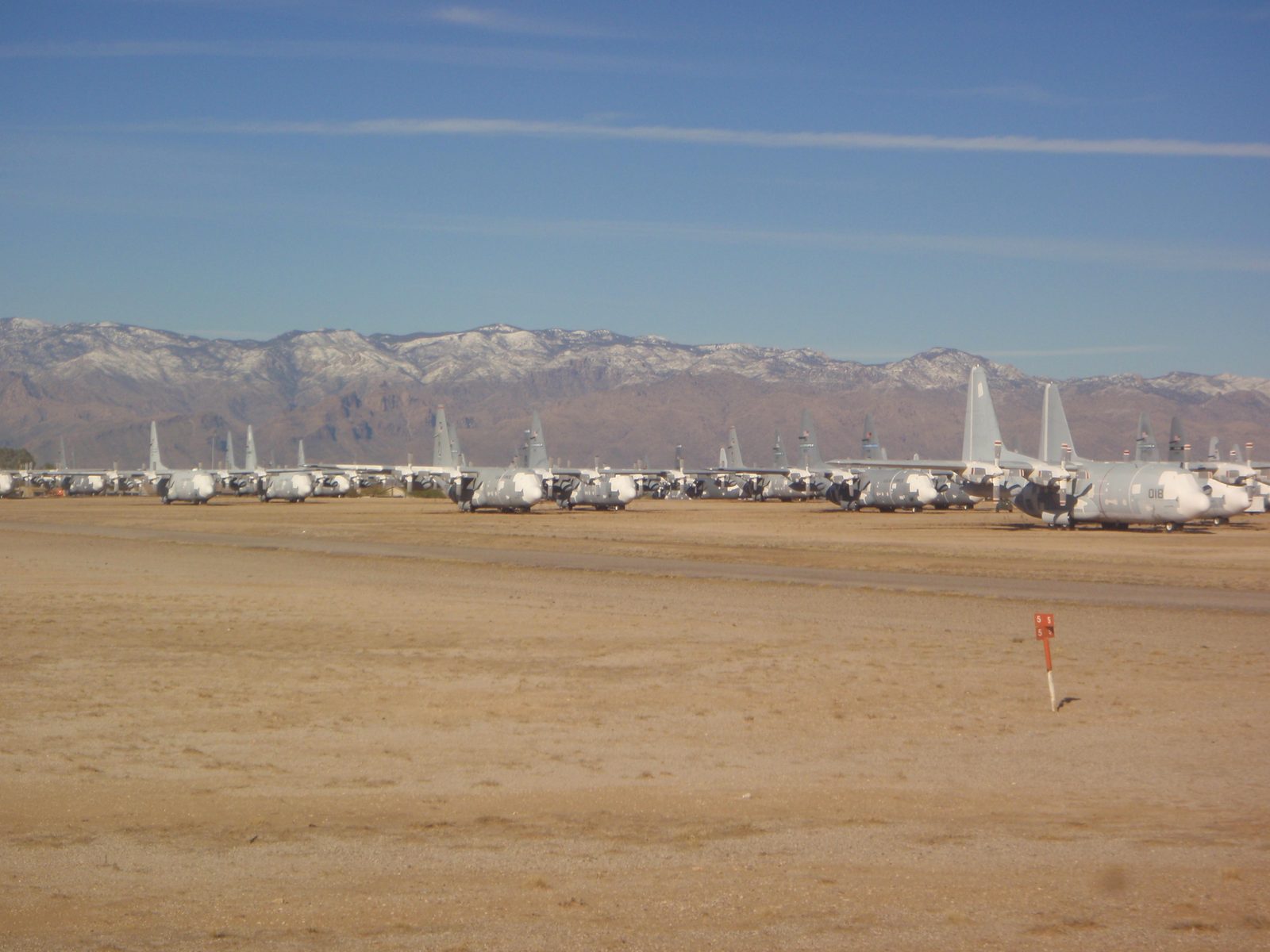 Larger cargo or transport planes lined up.