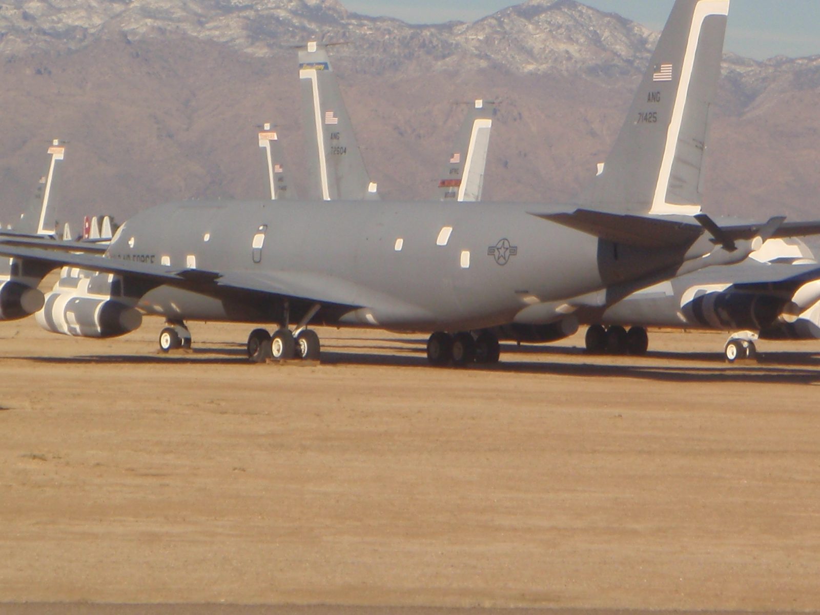 Weird contrast between the snow covered Catalinas and these sleeping war beasts.