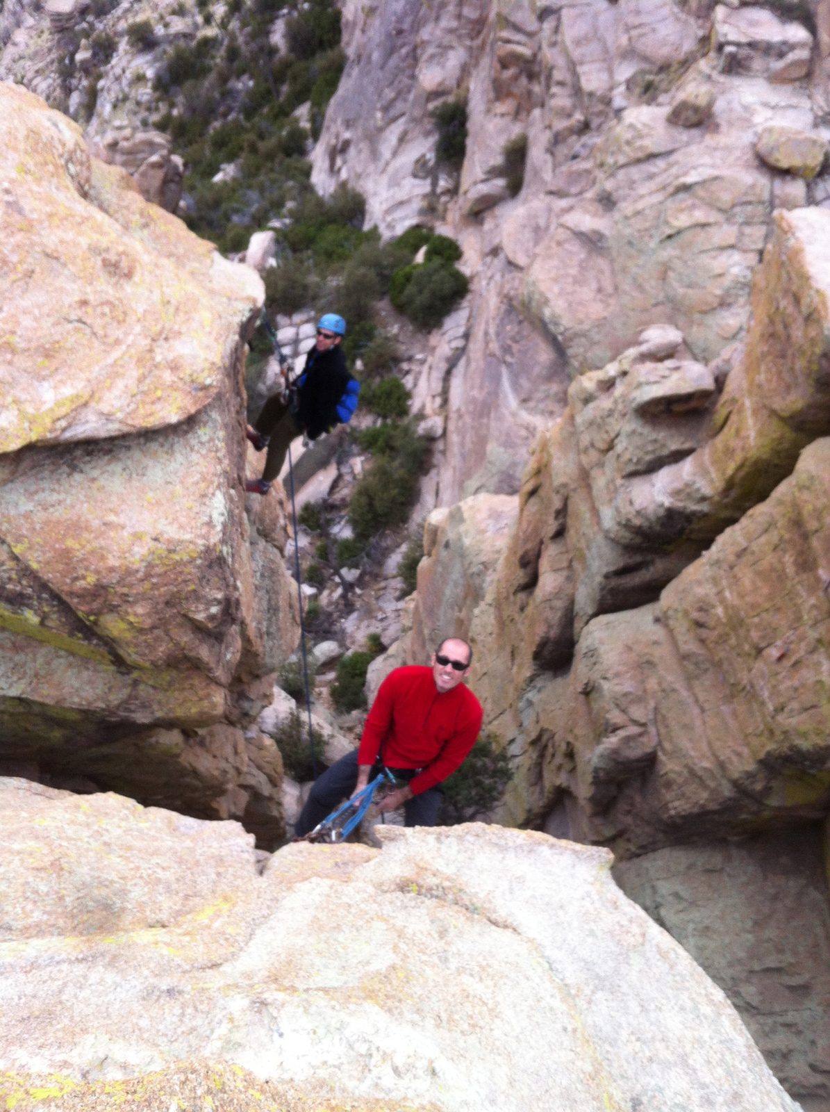 Ian and Pietro both on rappel from Blazing Fin... Ian is rappelling of the back of the side we...