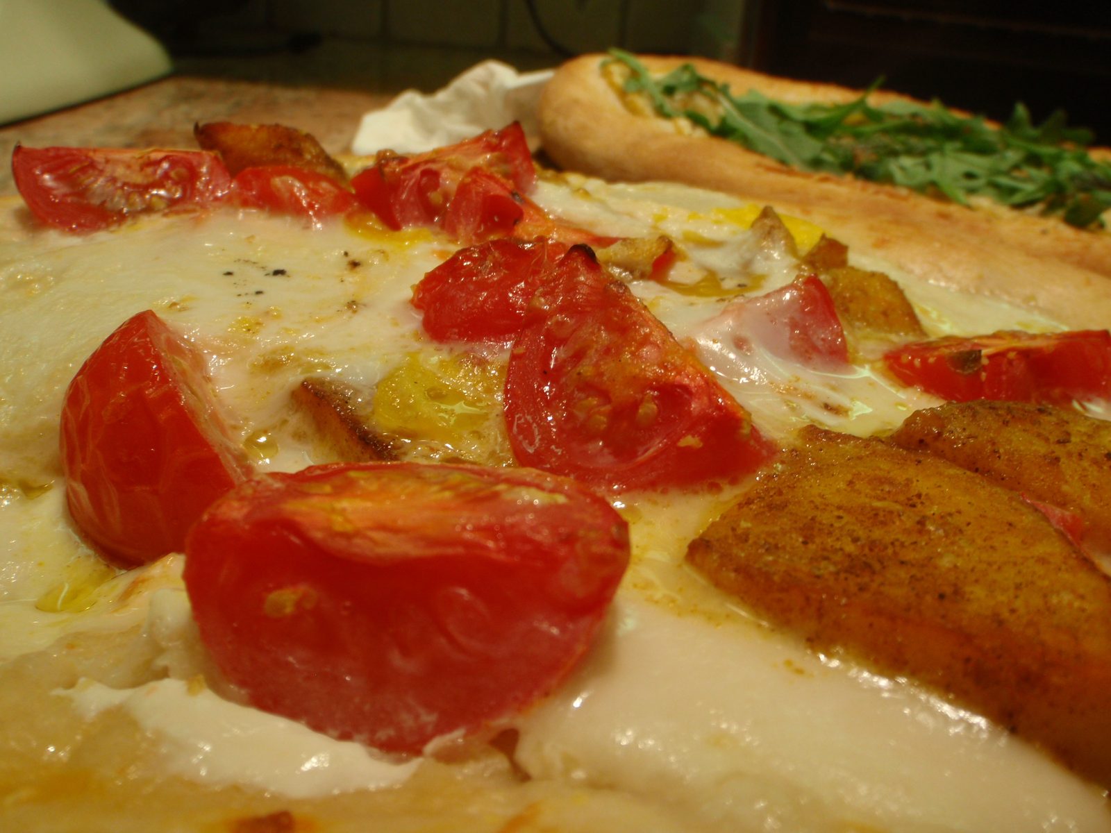 Detail of breakfast pizza.