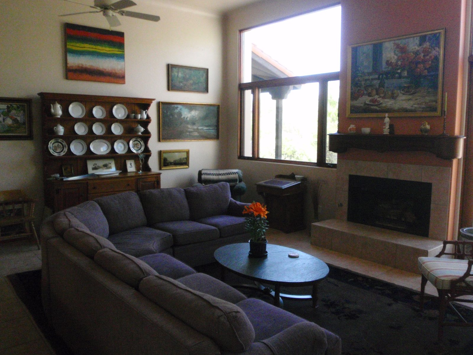 Picture of Mom and Dad's living room the day I left. We hung a lot of pictures and added some...