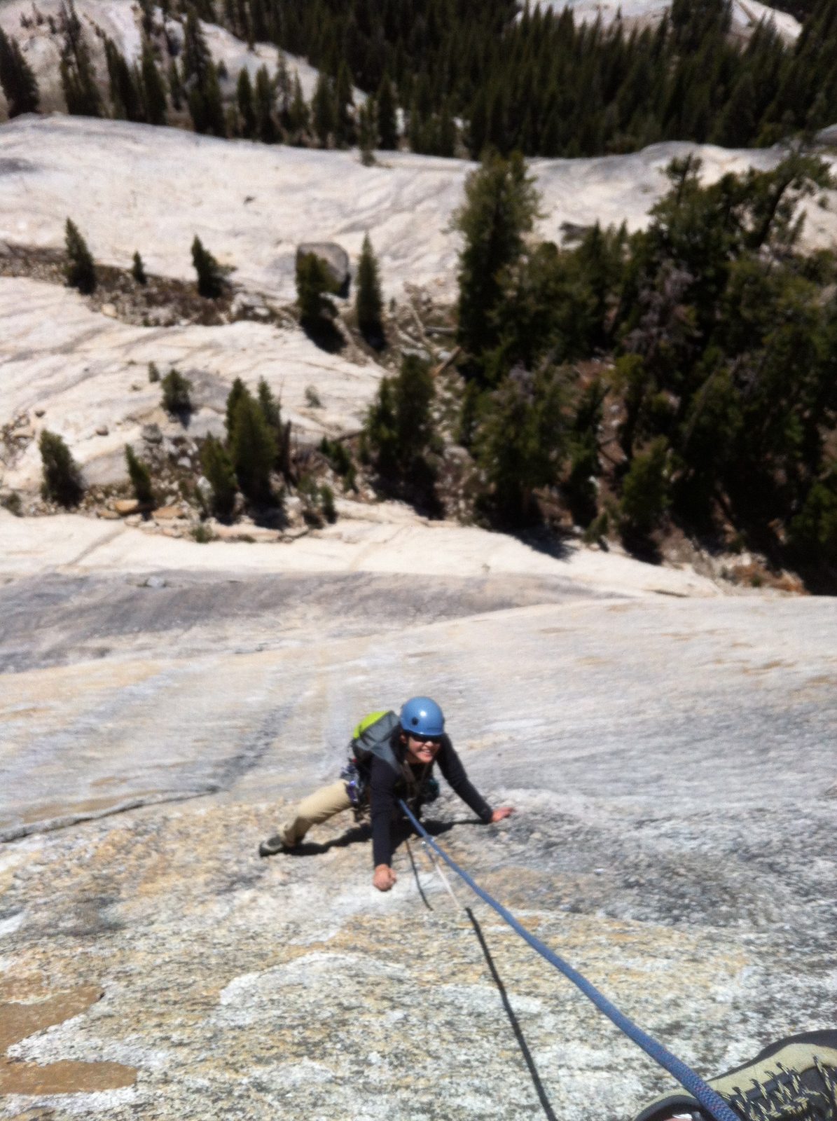 Monica, climbing over the lip of Crescent Arch (5.10b), on DAFF dome. My camera did not focus...