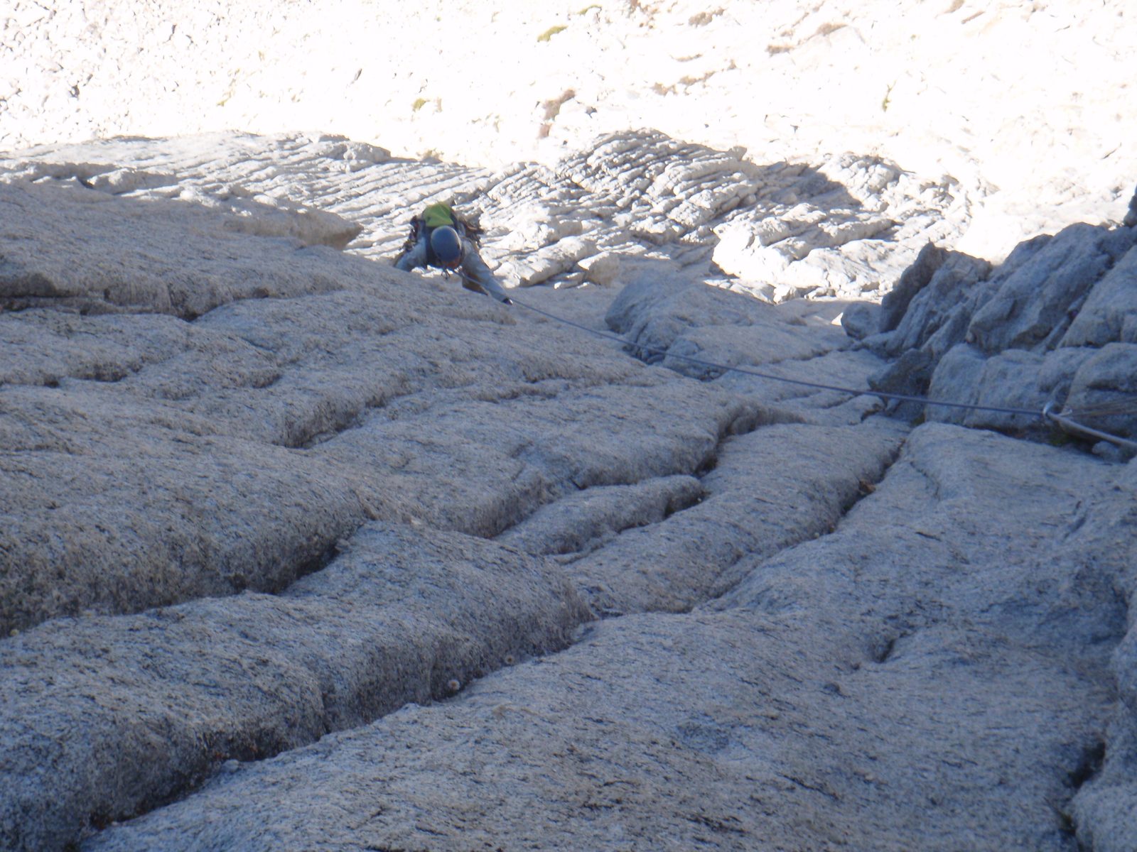 Monica, making a delicate traverse on the second pitch of West Ridge of Mt. Conness.