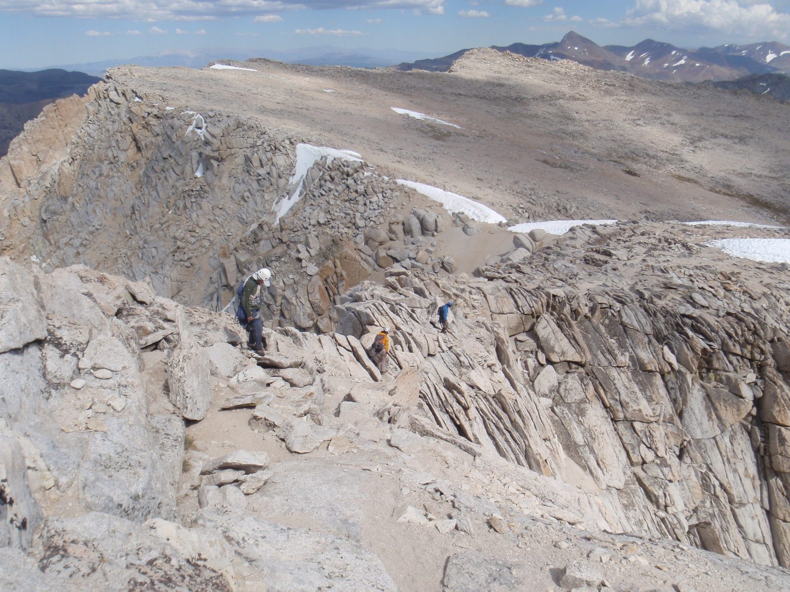 Traversing a narrow ridge over to the plateau.