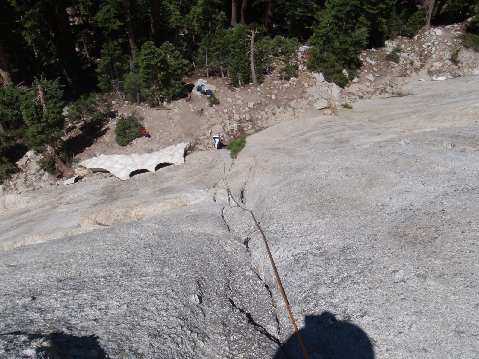Jay, ready to start the first pitch of Holdless Horror (5.6). Snow at the base of the route, in...