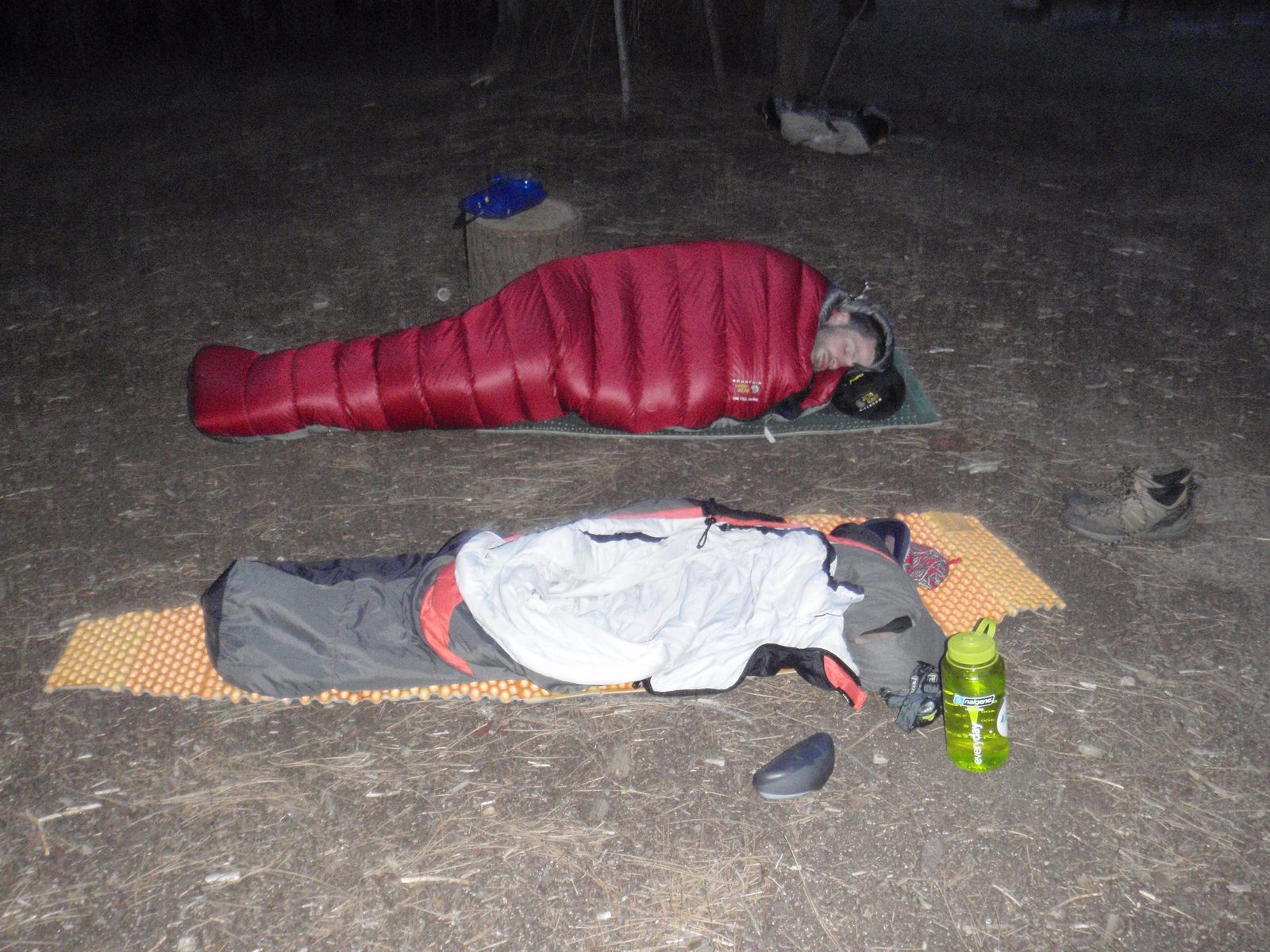 Sleepytime! Our ultralight camping setup: lightweight sleeping bags and thin foam mats. At 6,000...