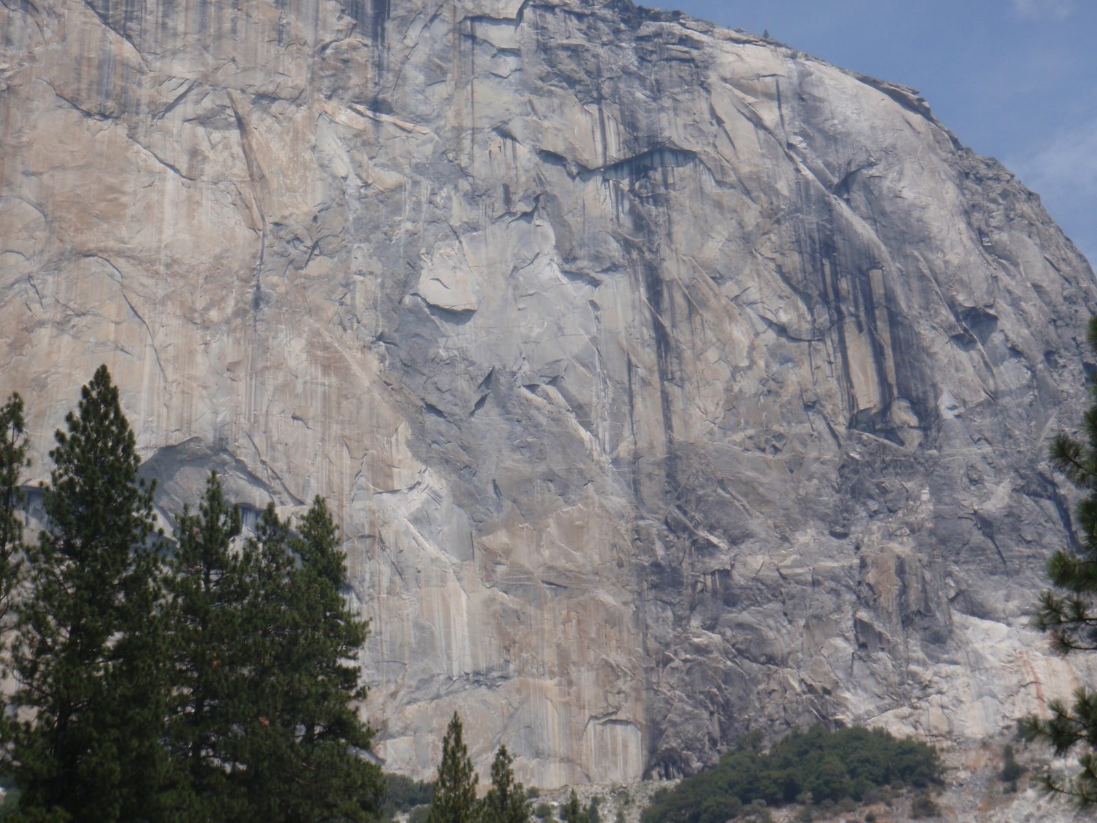 Generally a view of the Zodiac route. There are at least two climbing parties visible on the route.