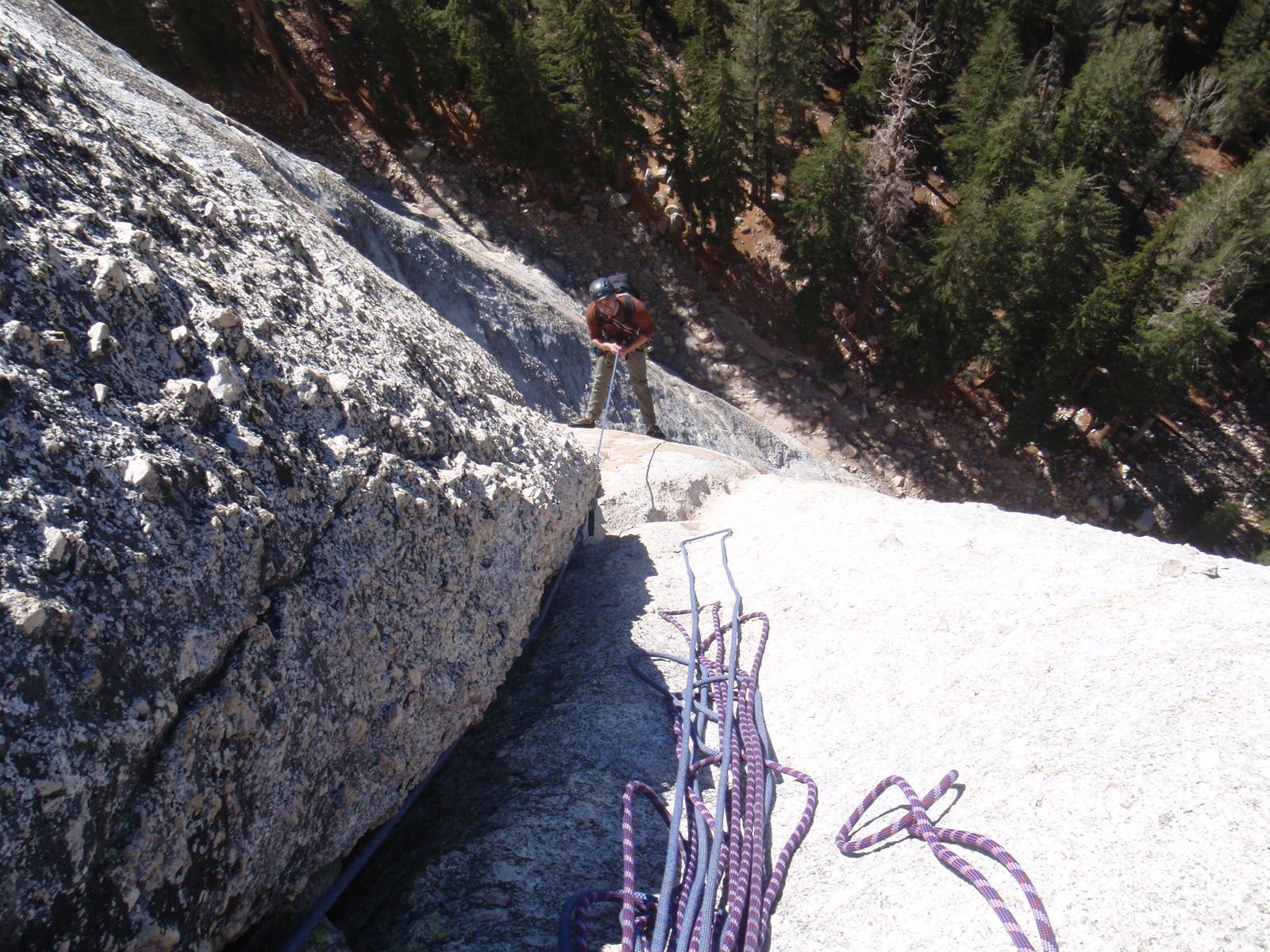 Alex, on the 3rd pitch, taking a break after trying a powerful 5.10a lieback around a roof onto...