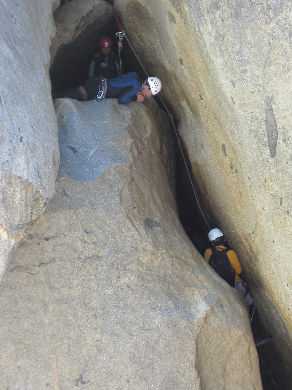 Colin watching as Eliah rappels.