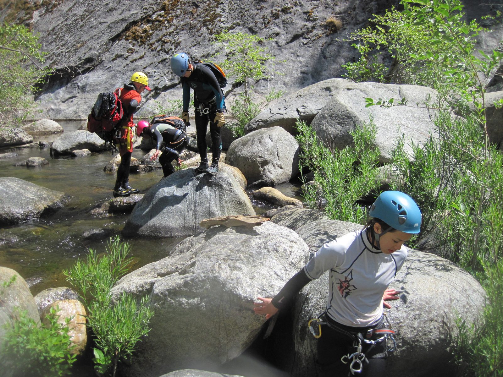 John, Aditi, Monica and Tracy move down river through a more benign section of canyon.