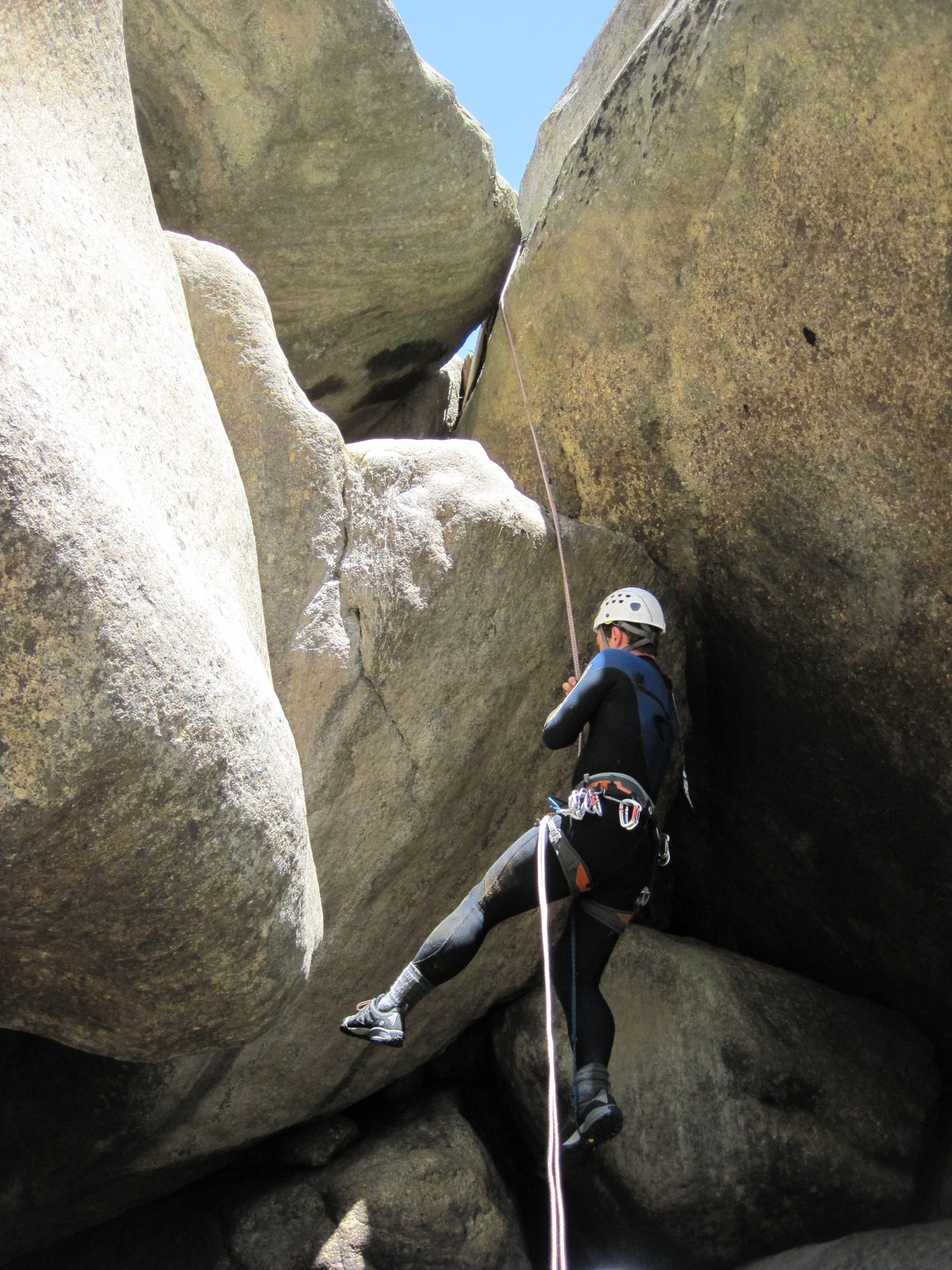 Colin, working his way back up. The way this works is you attach two smaller loops of rope...