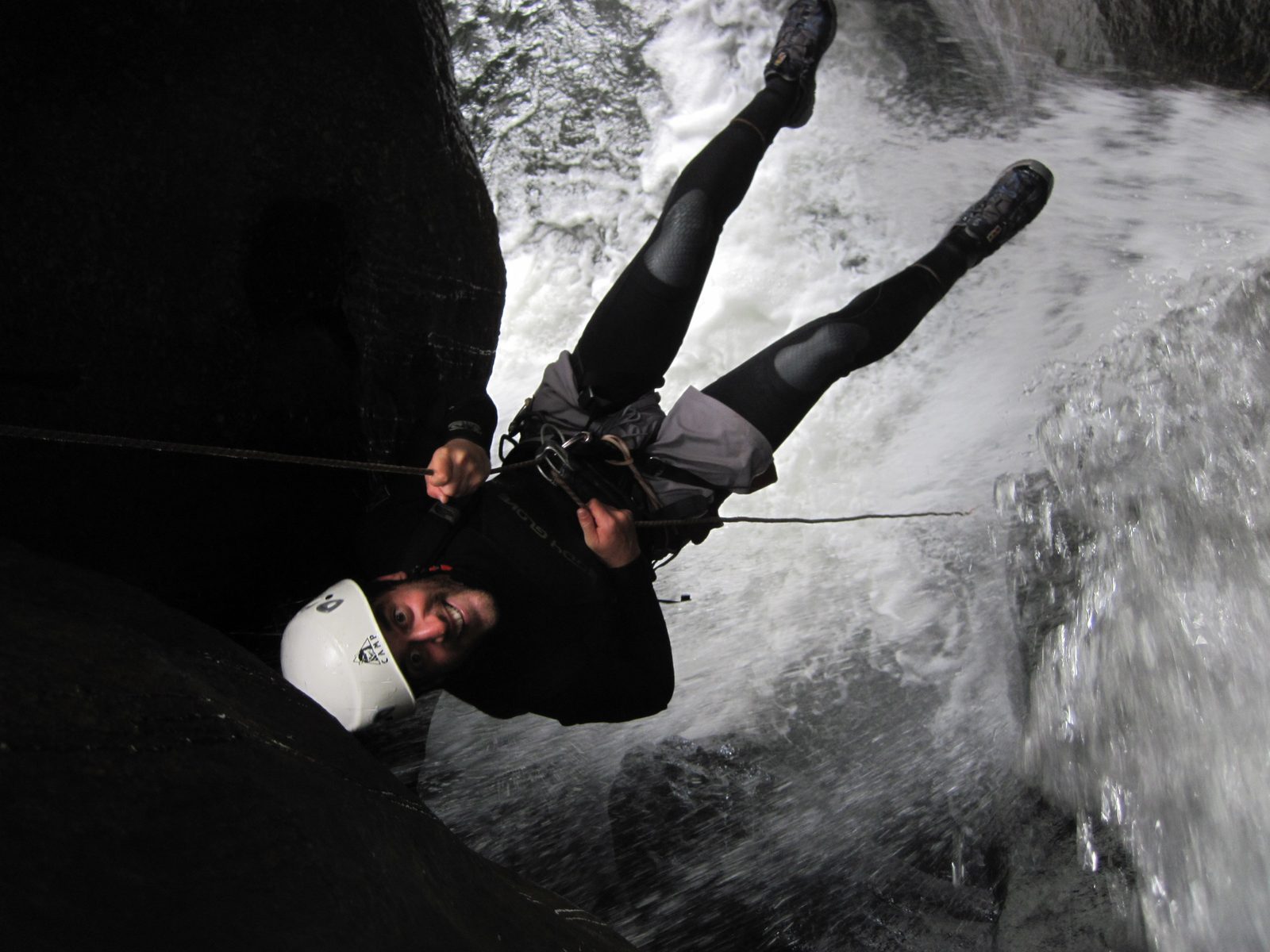 Here is Eliah, rappelling into the whirlpool.