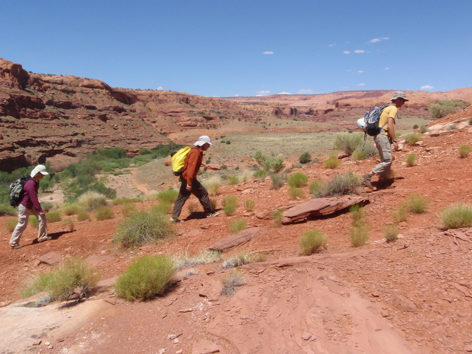 Trudging uphill in the hot sun. No shade anywhere. Turtle, Joel and Andy (at the front).