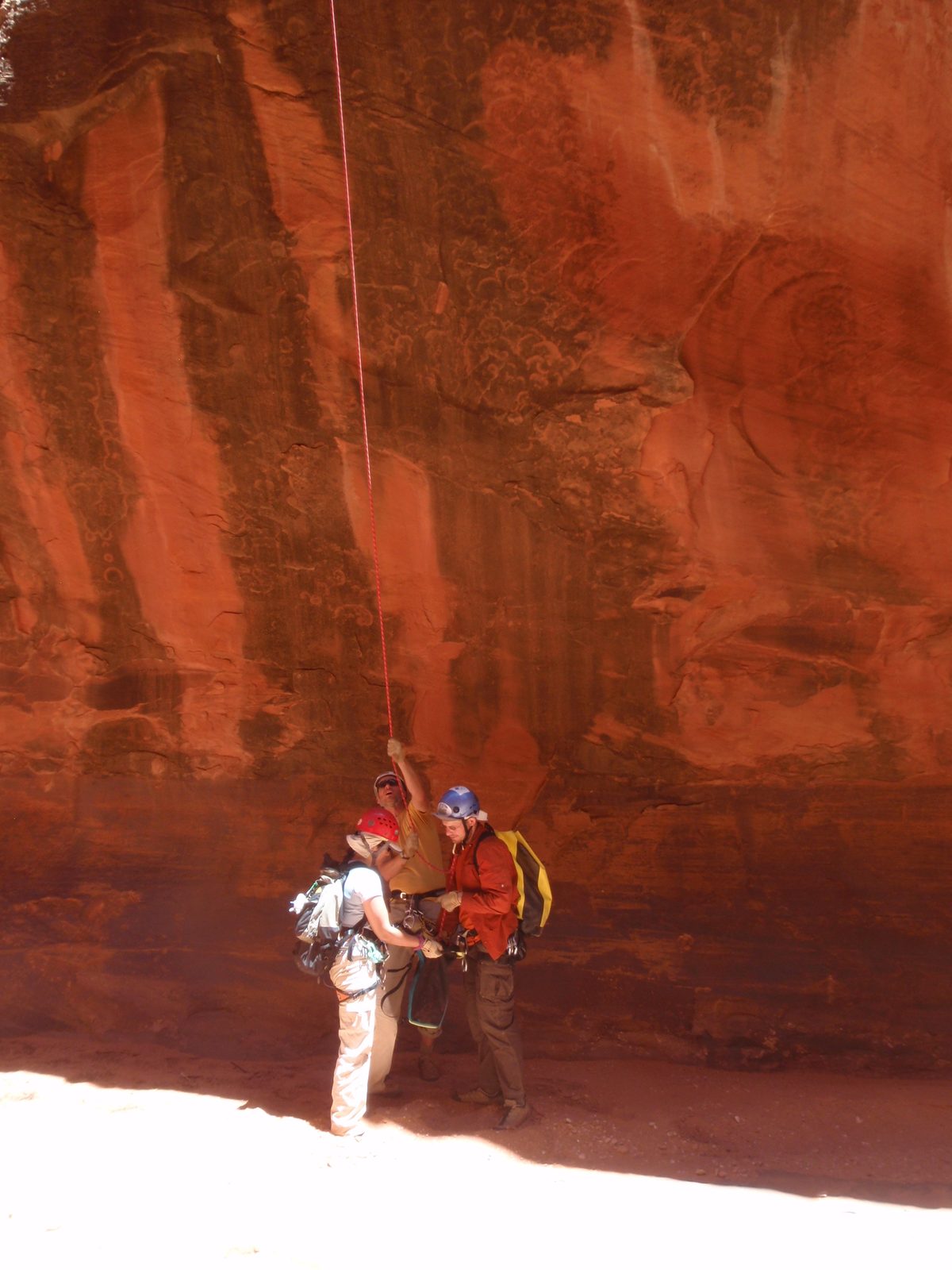 The team pulls the rope down.