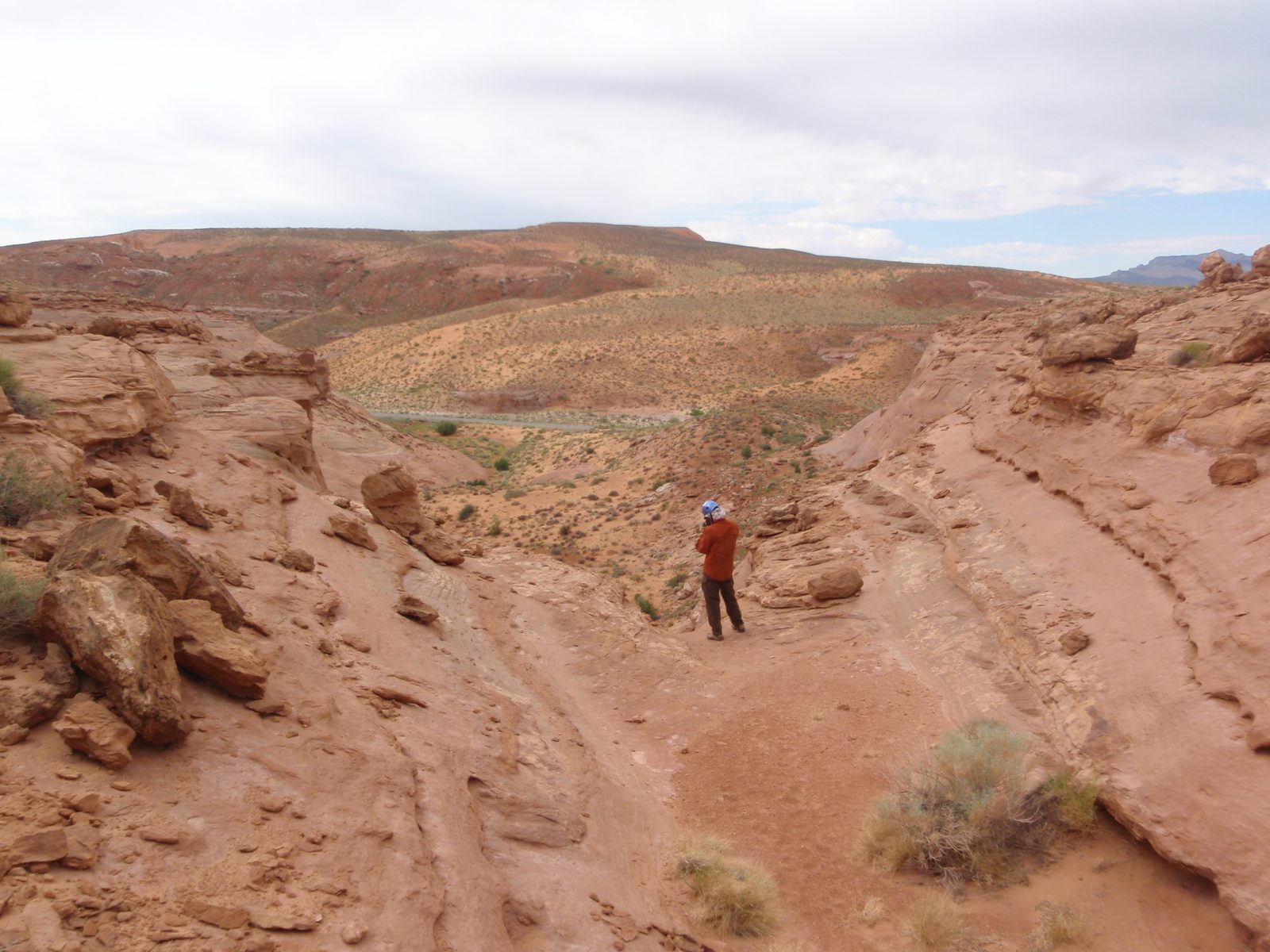Joel observes the world below. The road is where our car is.