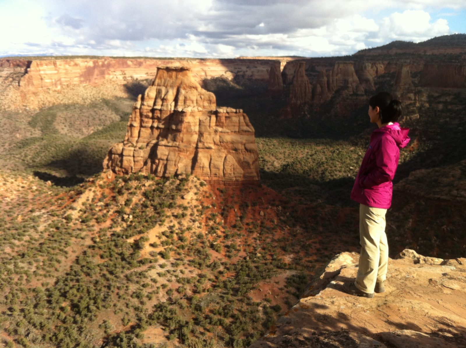The route goes up the shadowy part toward the middle, traversing right onto an enormous ledge...