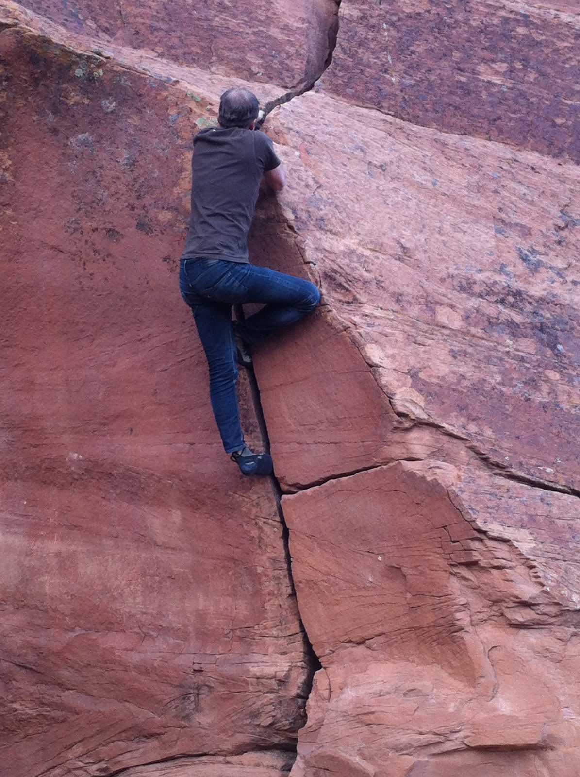 John bouldering on a short hand crack.