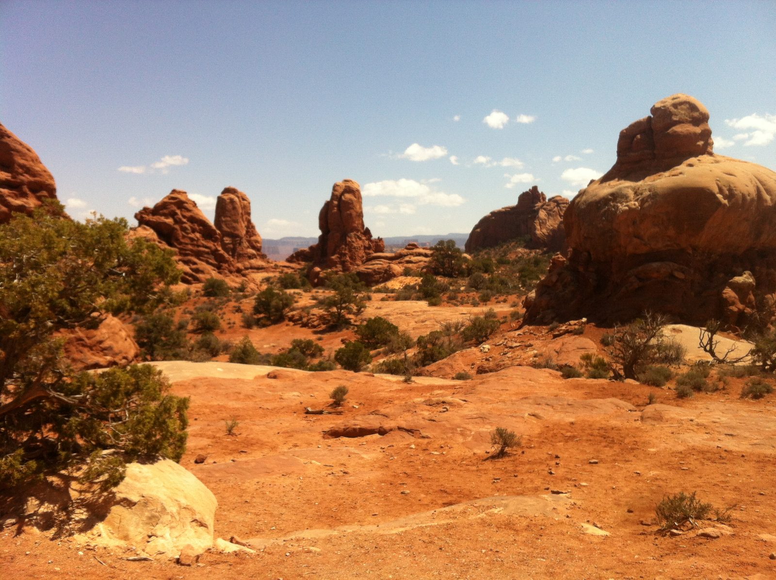 Hiking around the desert. More small towers.