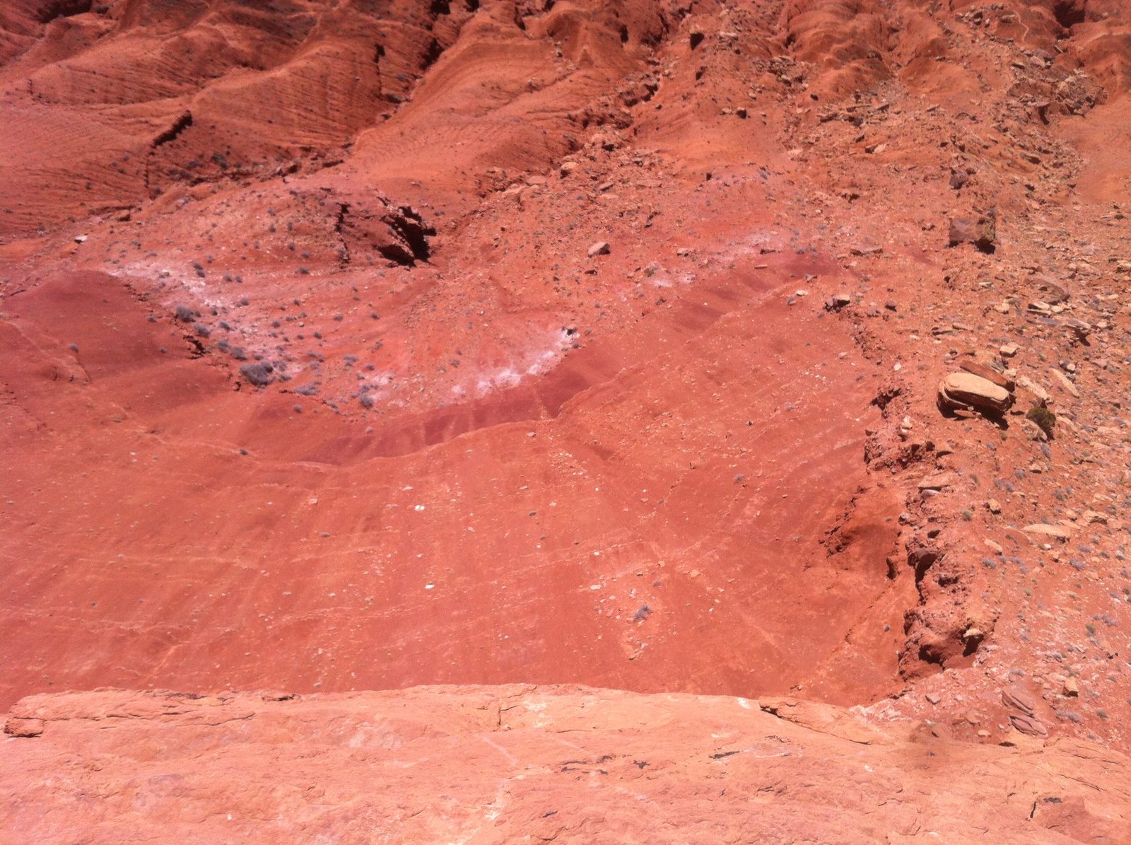 View down over the edge, yikes! Our approach trail can be made out faintly at the far right.
