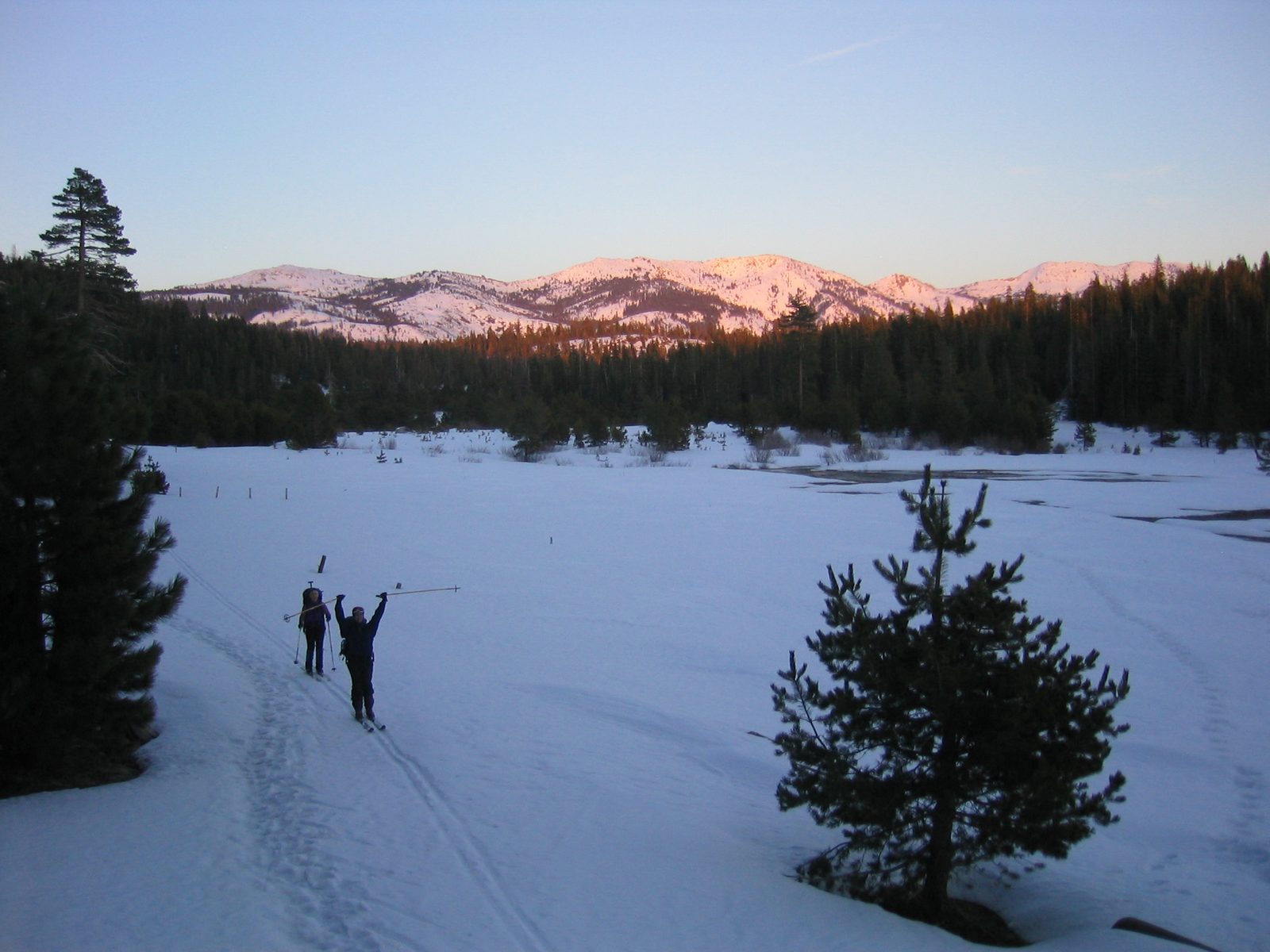 Michael and Glenda, celebrating their arrival at Van Vleck Bunkhouse, with the alpen glow on the...