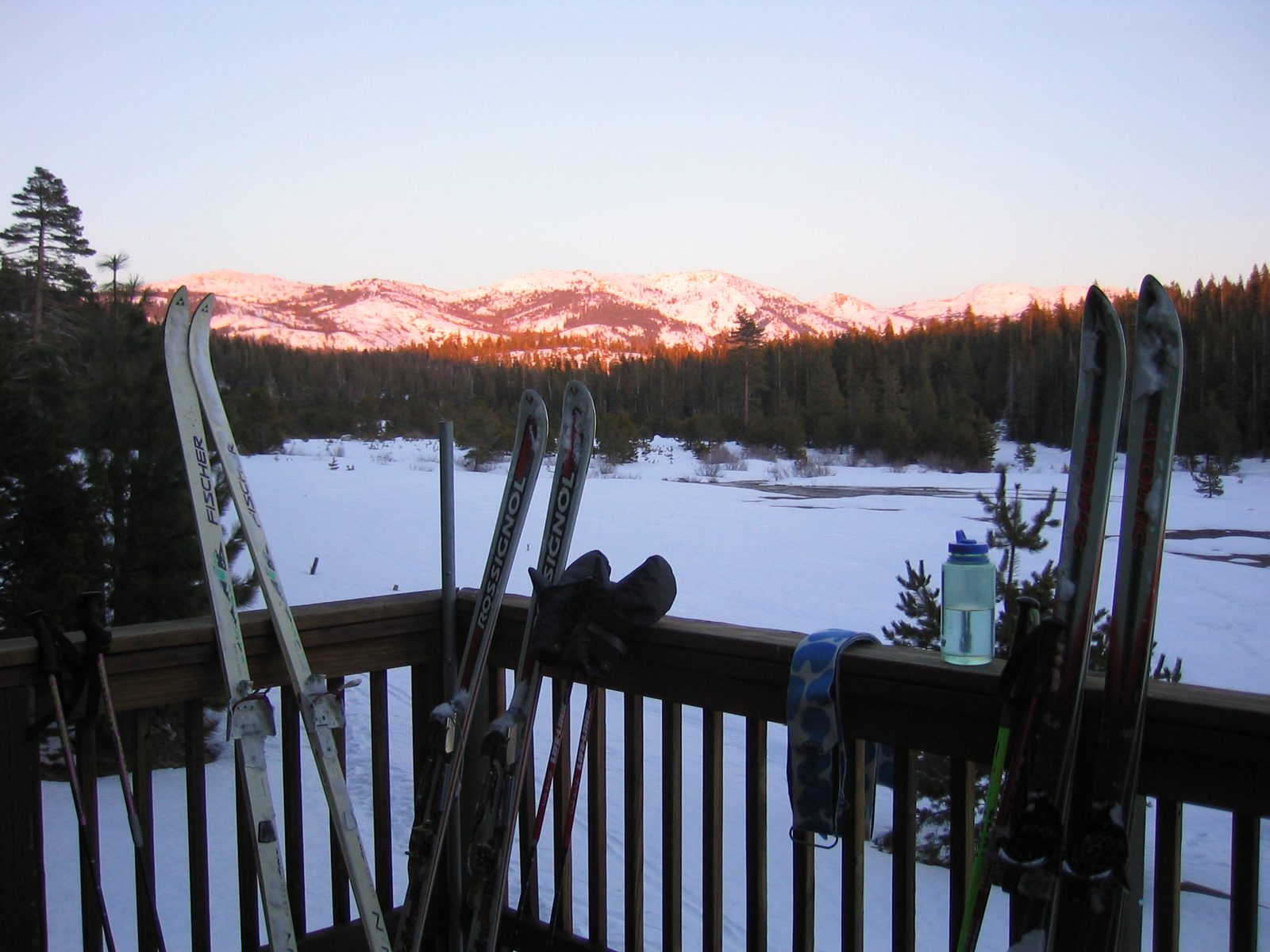 The alpen glow on the Crystal Range grows more intense, while both we and our skis take a...