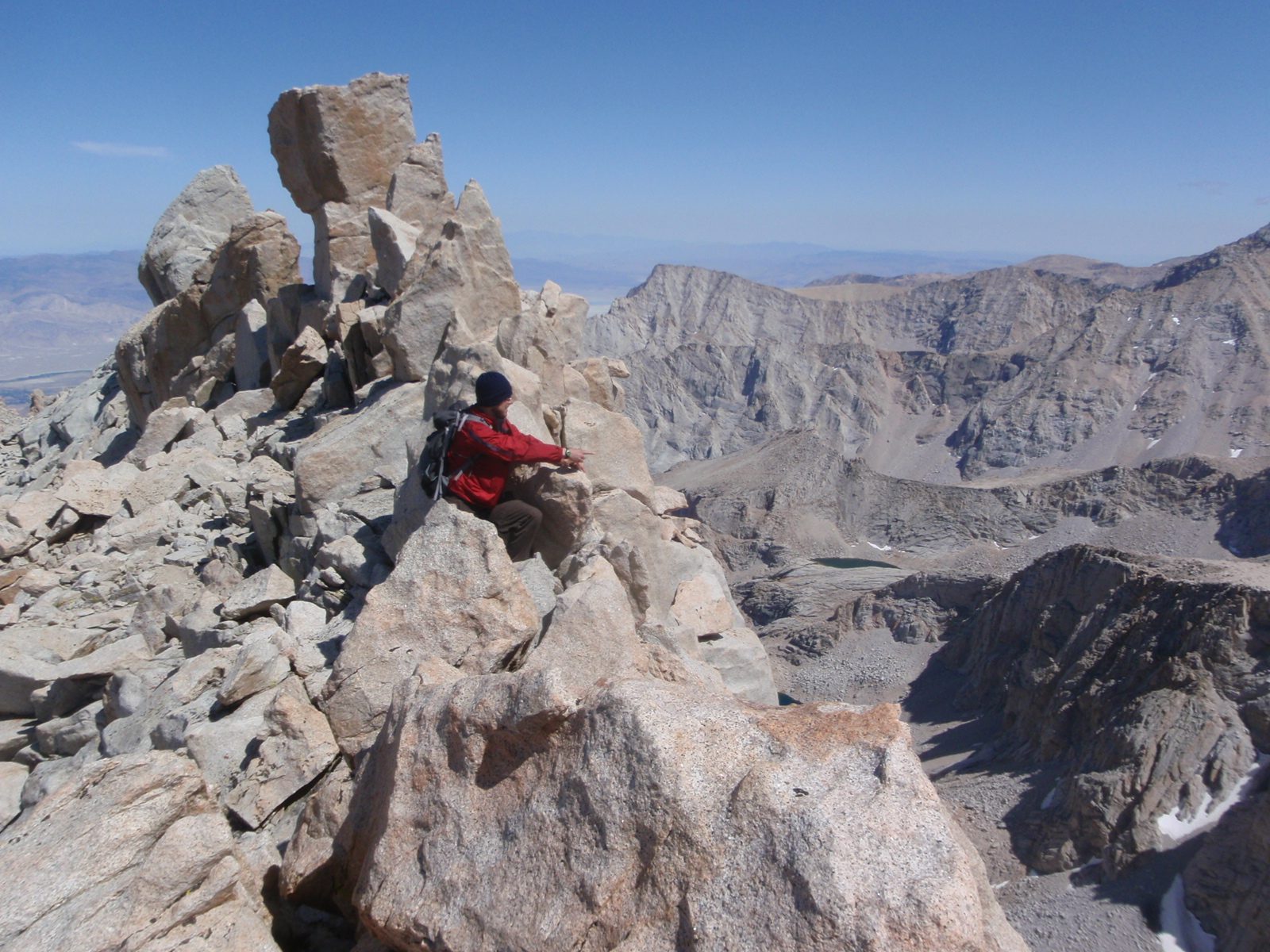 Joel, stopping to gaze across at Mt. Whitney (not pictured) while on the East Ridge of Mt. Russell.