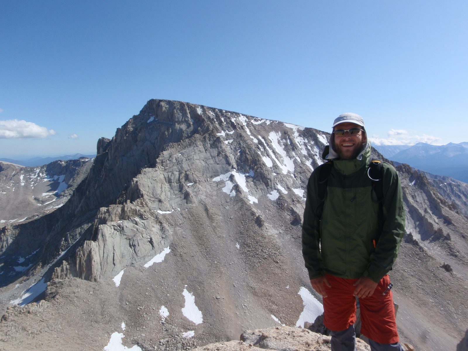 John, on the summit of Mt. Russell, with Mt. Whitney in the background, almost 400 feet taller...