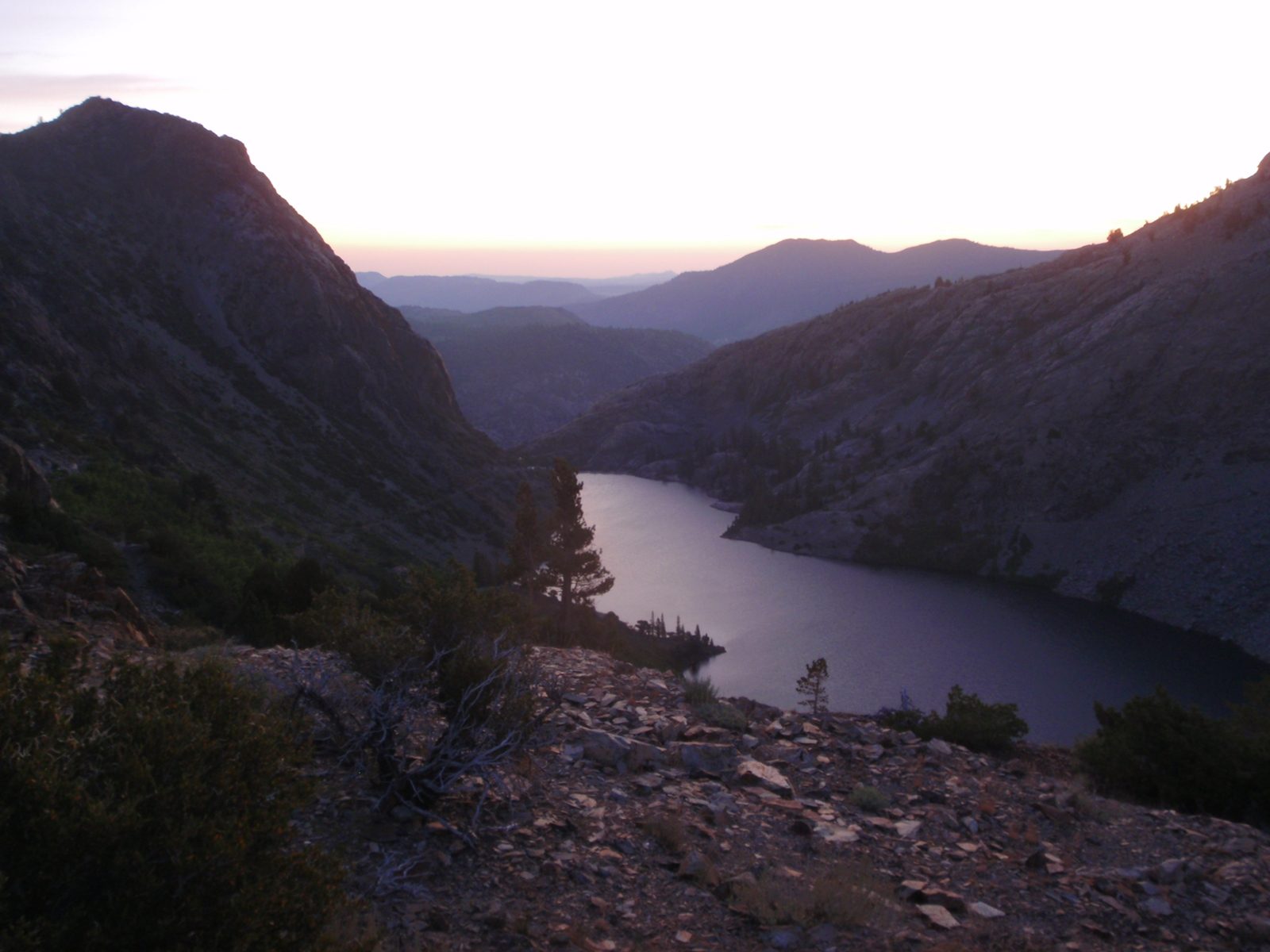 After passing the dam of Gem Lake, I came upon Agnew Lake, perhaps 500 feet lower, and with...