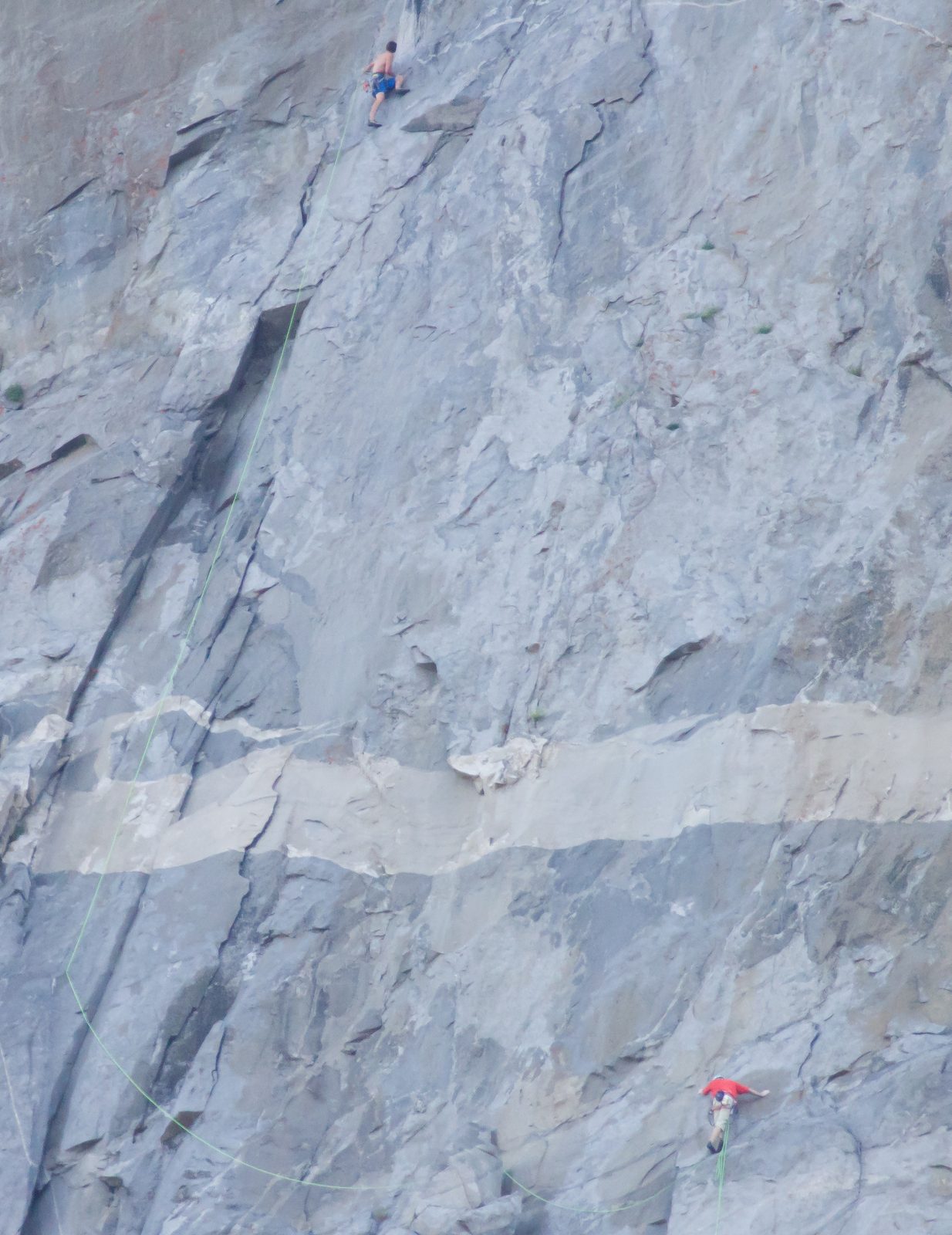 I see maybe one piece of protection between the climbers, though maybe Alex is adding a second.