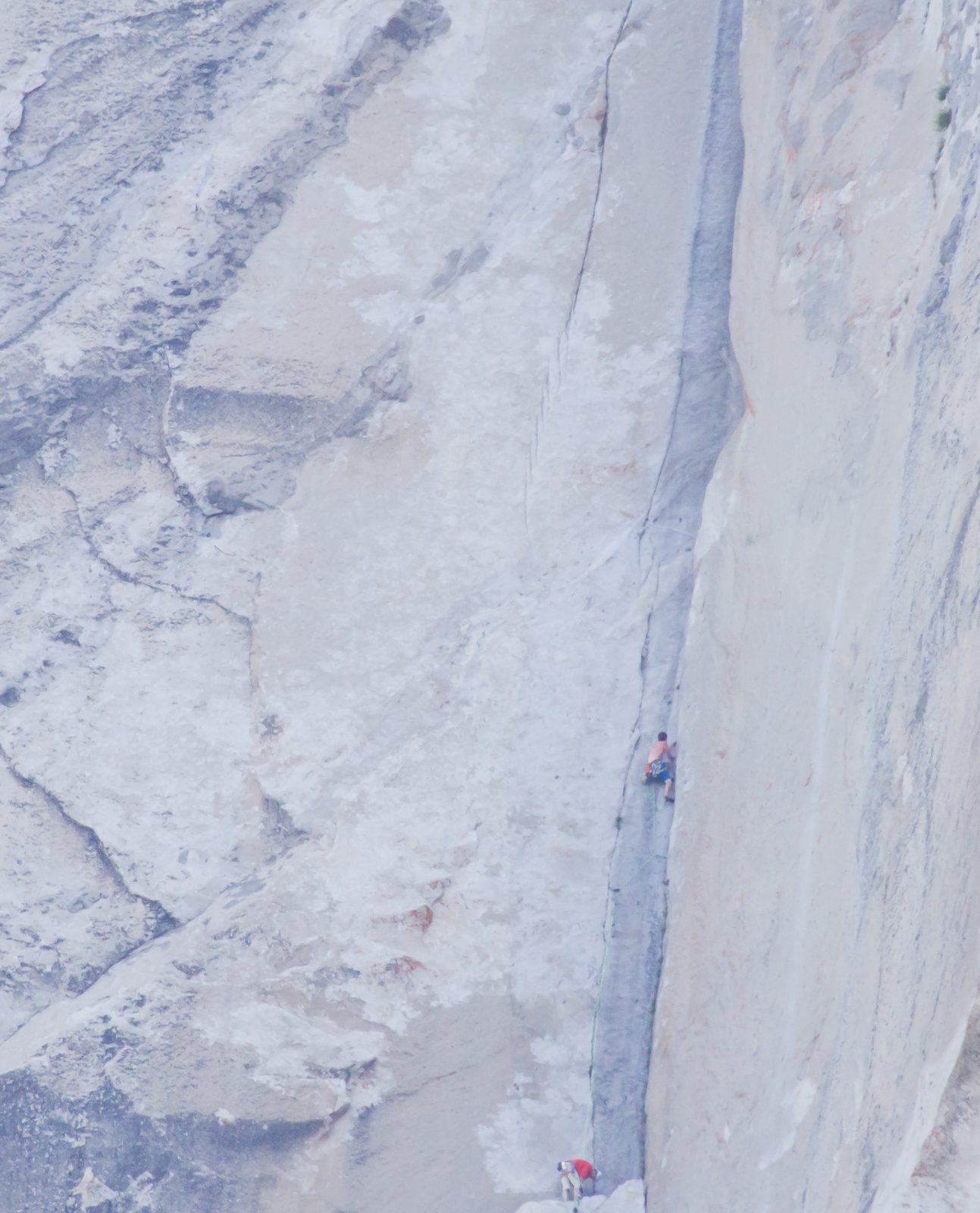 Hans almost catches up to Alex. Alex has mostly been free climbing the route with a bit of aid,...