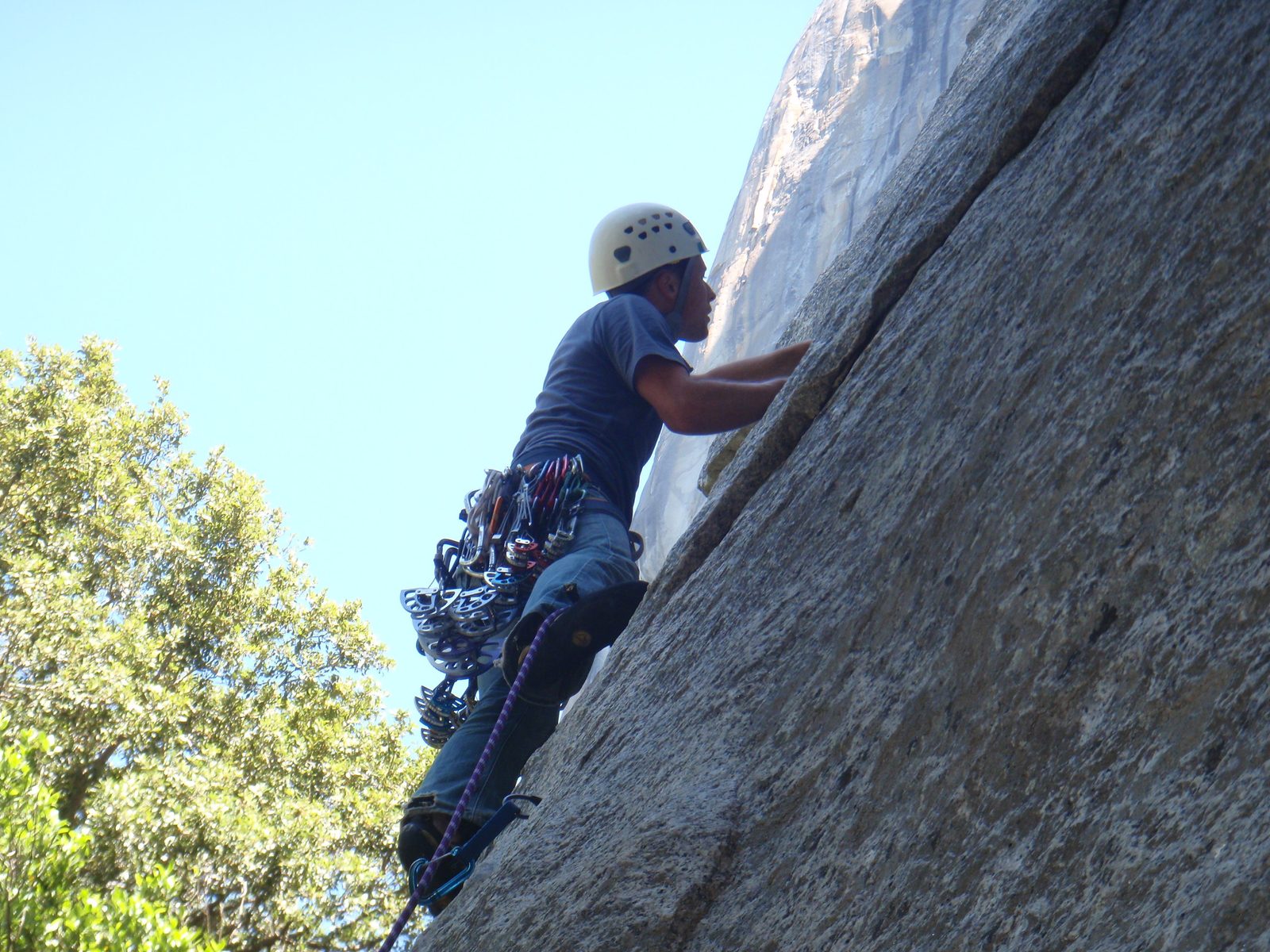 My face barely kissing the El Cap headwall (Salathe maybe?) on lead on Moby Dick (5.10a).