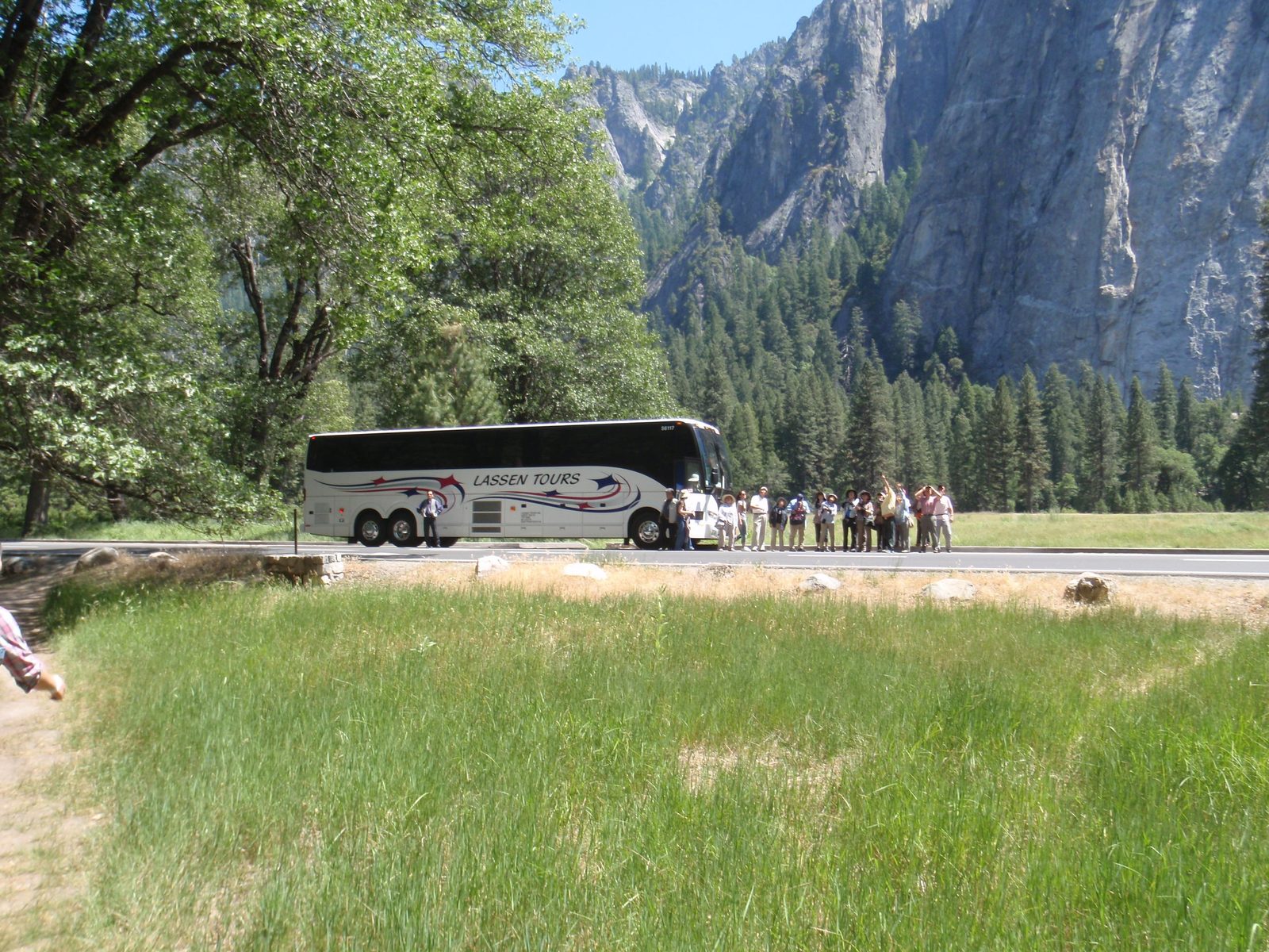 Tourists taking photos of El Capitan.