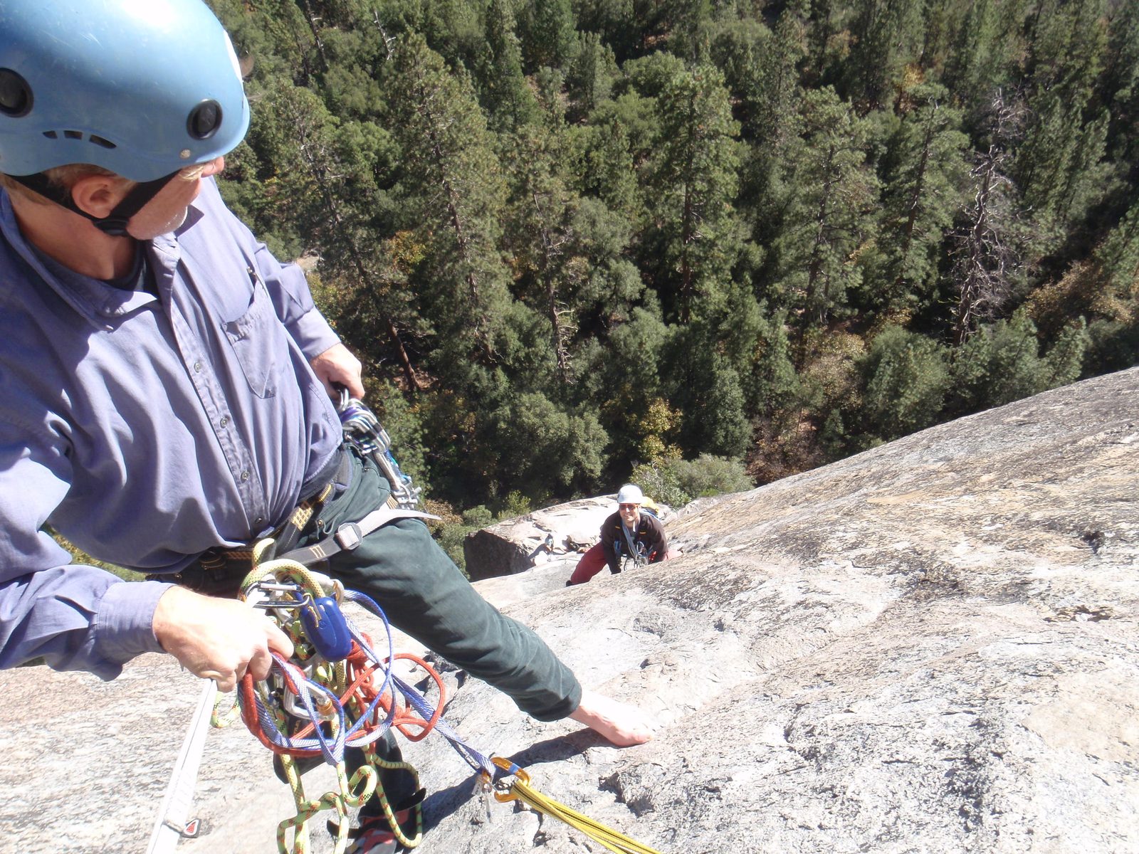 I gave the camera to Dong and she snapped a few photos of me as I led pitch 3. Marlin in the foreground.