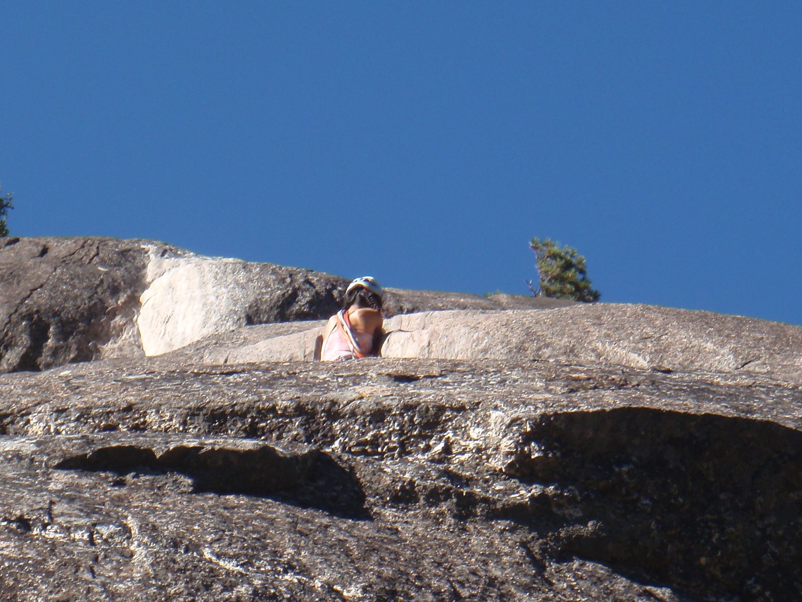 Dong, pulling a roof on pitch 4 of Nutcracker (5.8).