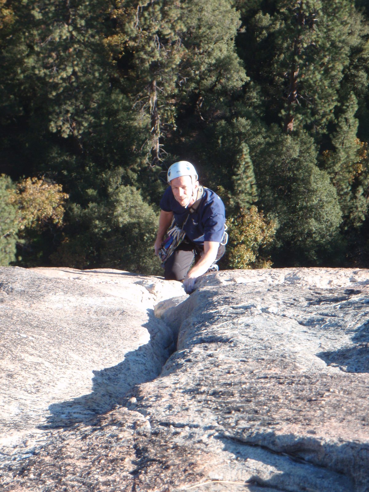Chris, hand jamming his way up pitch 4.