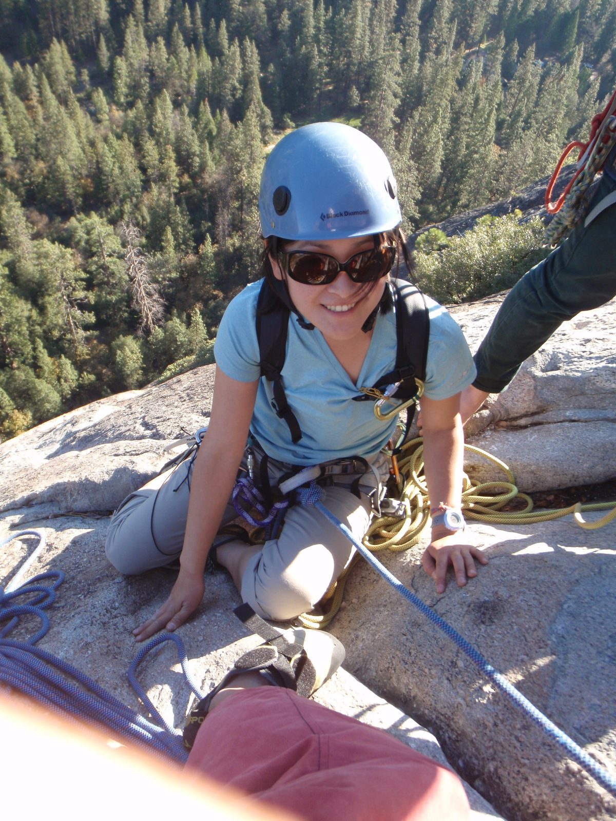 Monica hanging (literally) at the belay at the top of pitch 4.