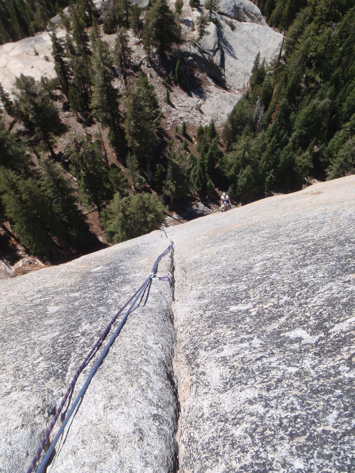 Looking down at the sublime 3rd pitch... 150 feet of seemingly endless finger crack on very...