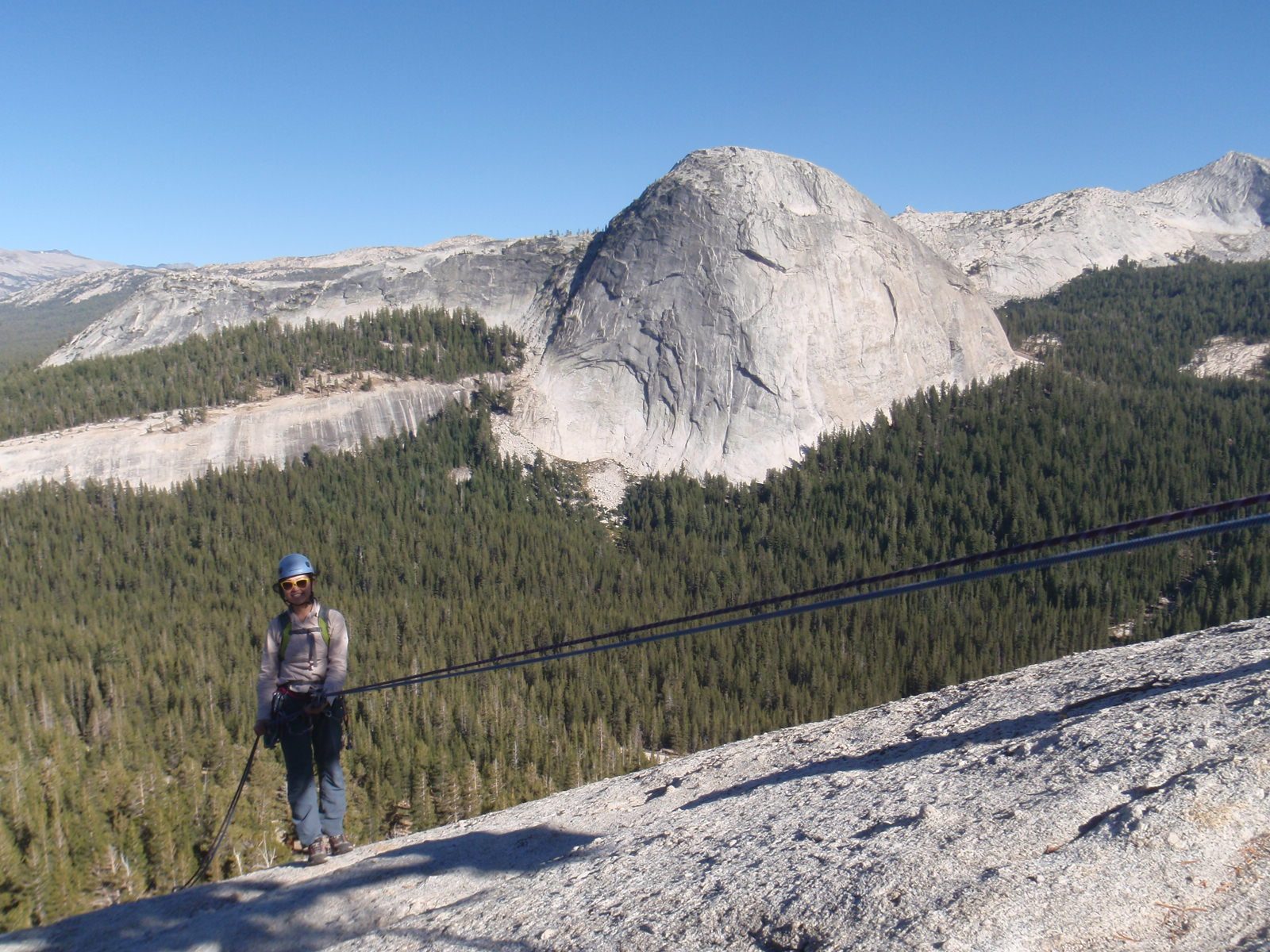 Monica headed down first, with the north face of Fairview Dome in the background.